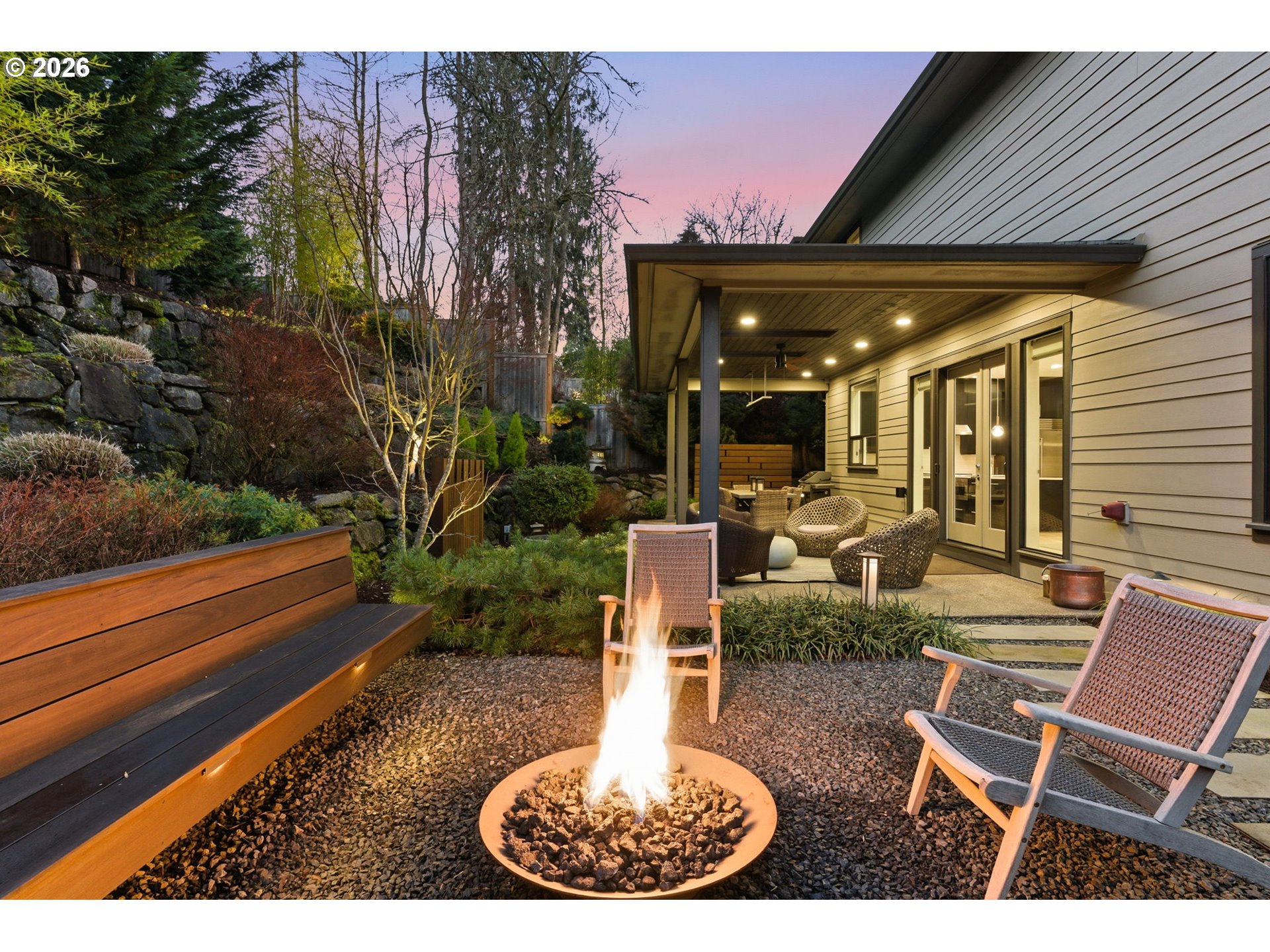 2123 South Military Road Portland, OR 97219 - Photo 4 of 47 a backyard of a house with yard fountain and outdoor seating