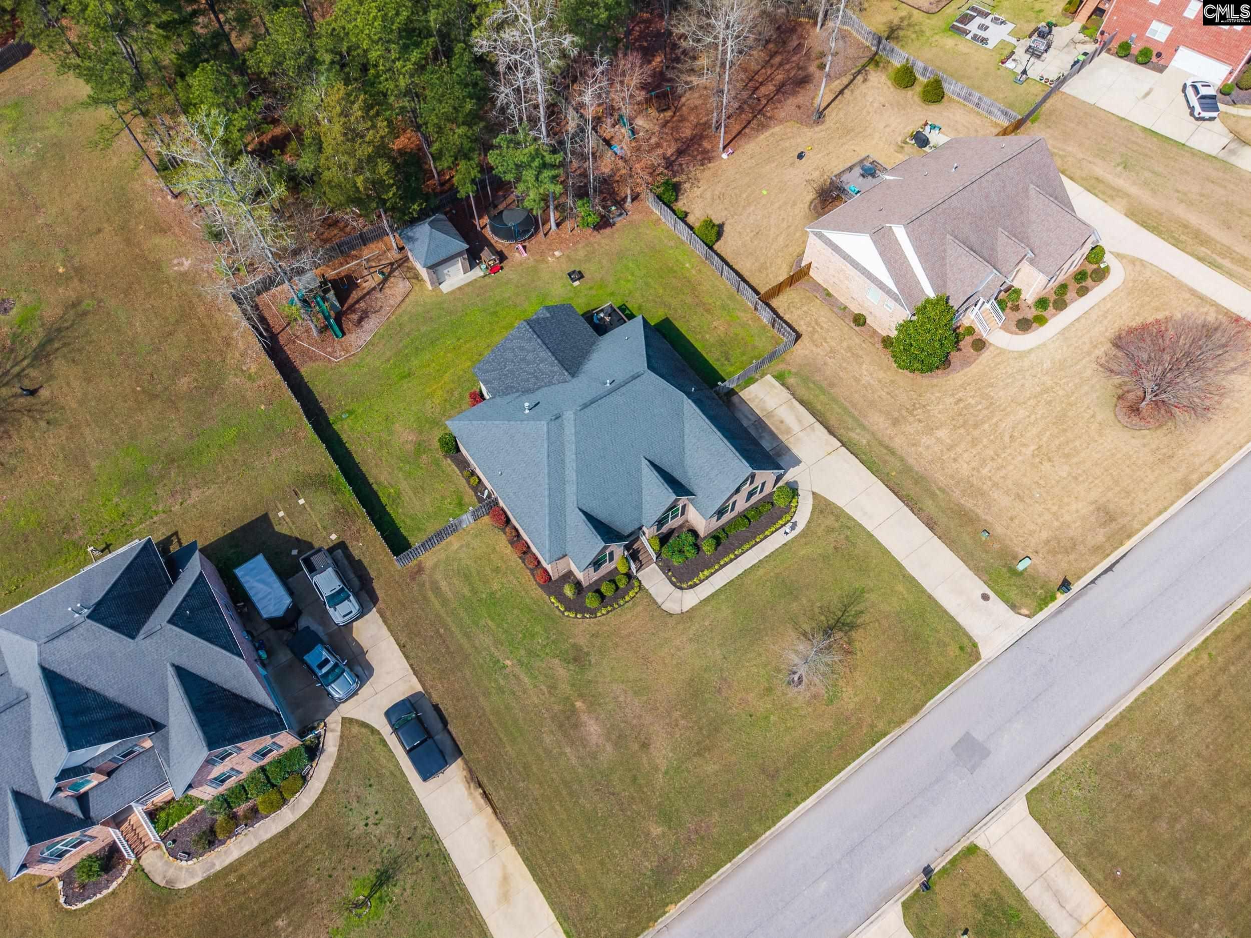 116 Renard Way Gilbert, SC 29054 - Photo 71 of 74 an aerial view of a house with a swimming pool