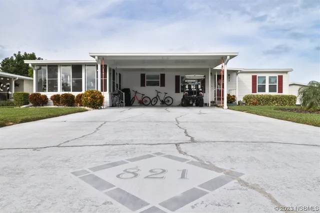 a view of a house with outdoor space and porch