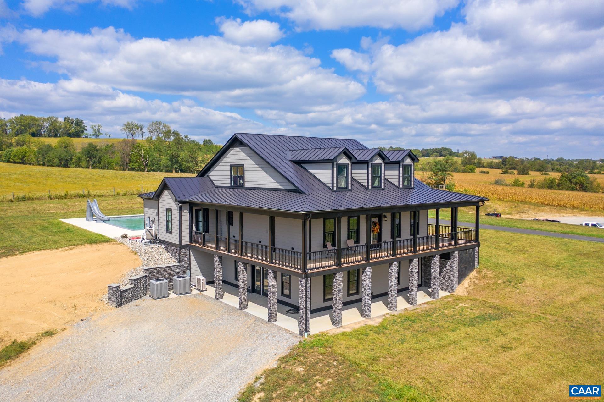 728 Long Meadow Road Fishersville, VA 22939 - Photo 1 of 52 a view of a house with wooden deck and ocean view
