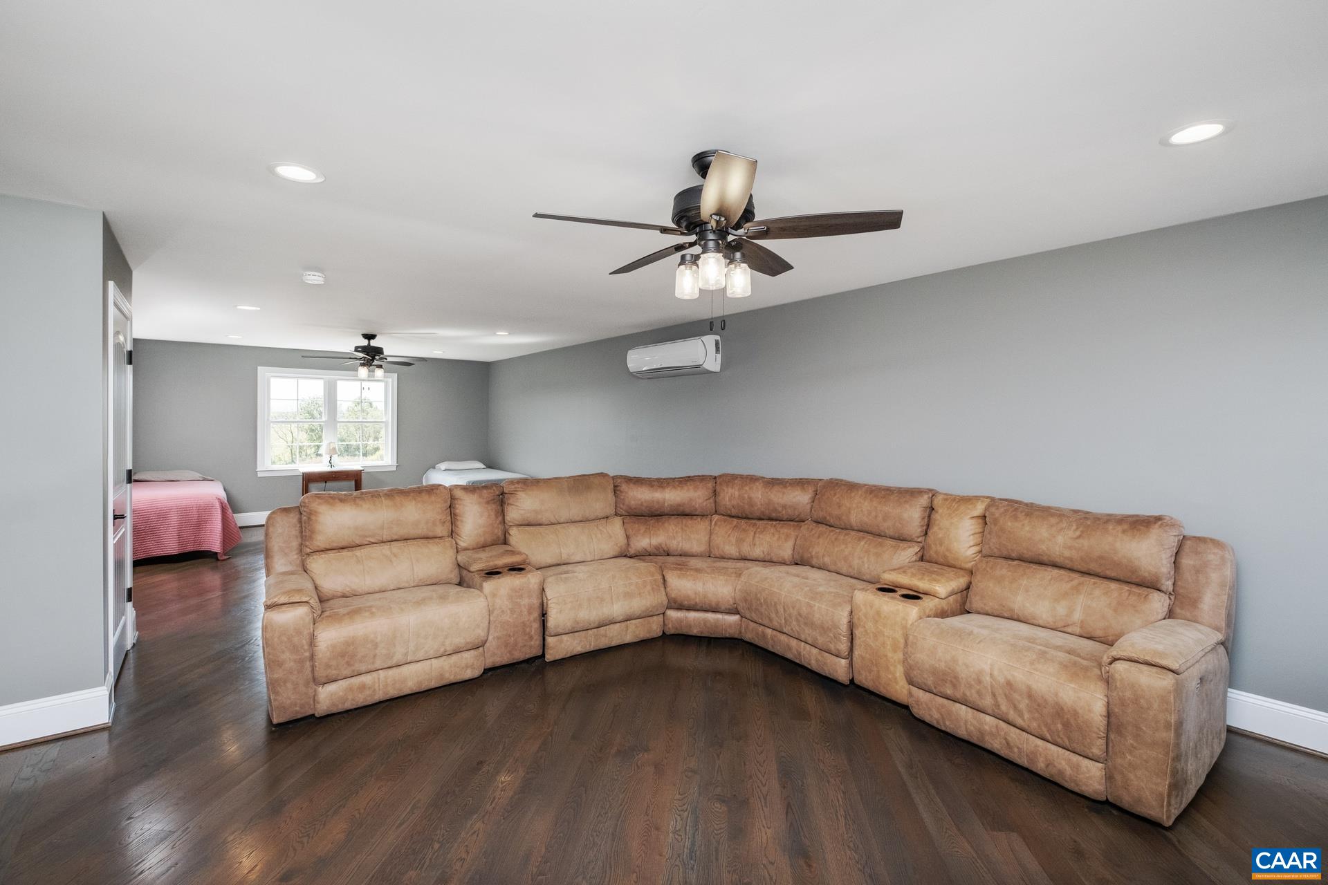 728 Long Meadow Road Fishersville, VA 22939 - Photo 28 of 52 a living room with furniture and a chandelier
