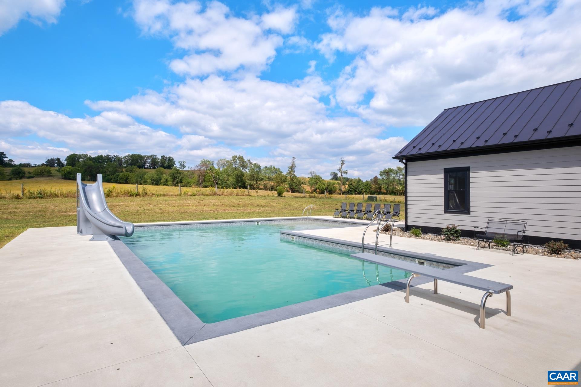 728 Long Meadow Road Fishersville, VA 22939 - Photo 38 of 52 a view of a terrace with chairs