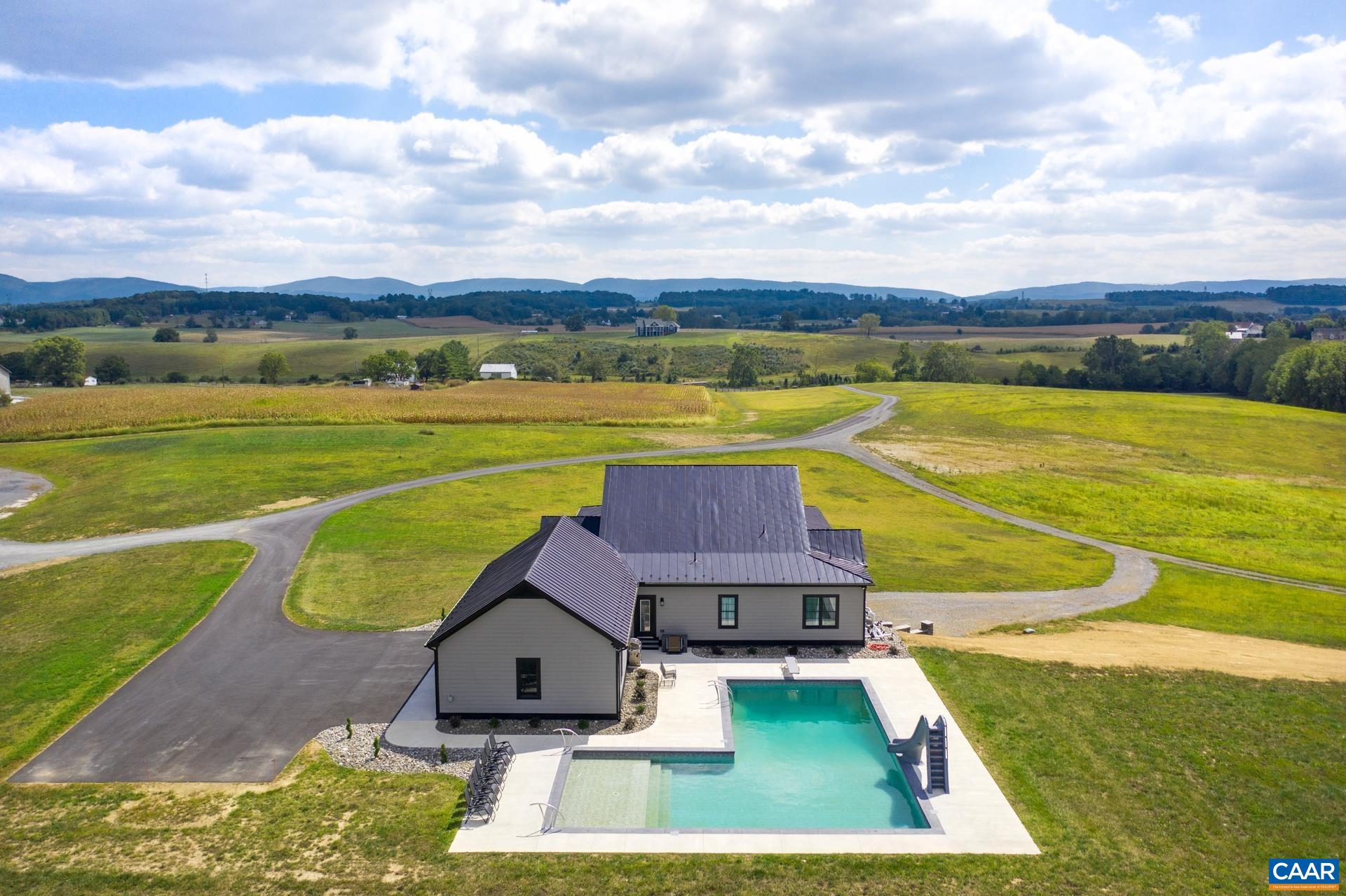 728 Long Meadow Road Fishersville, VA 22939 - Photo 4 of 52 an aerial view of a house