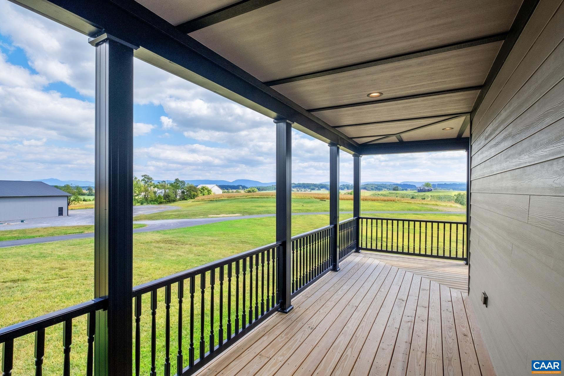 728 Long Meadow Road Fishersville, VA 22939 - Photo 46 of 52 a view of a porch with wooden floor