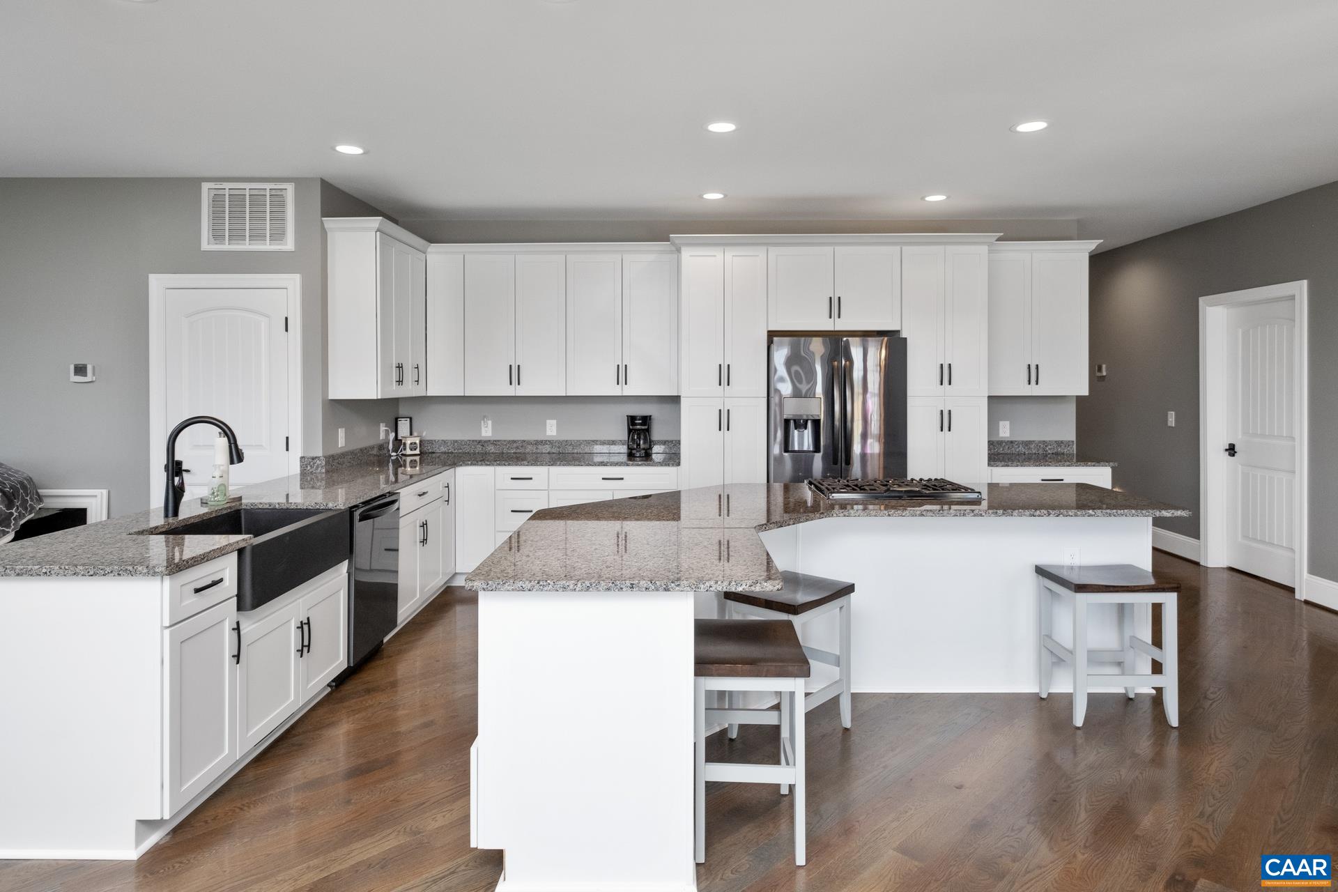 728 Long Meadow Road Fishersville, VA 22939 - Photo 5 of 52 a kitchen with refrigerator and cabinets