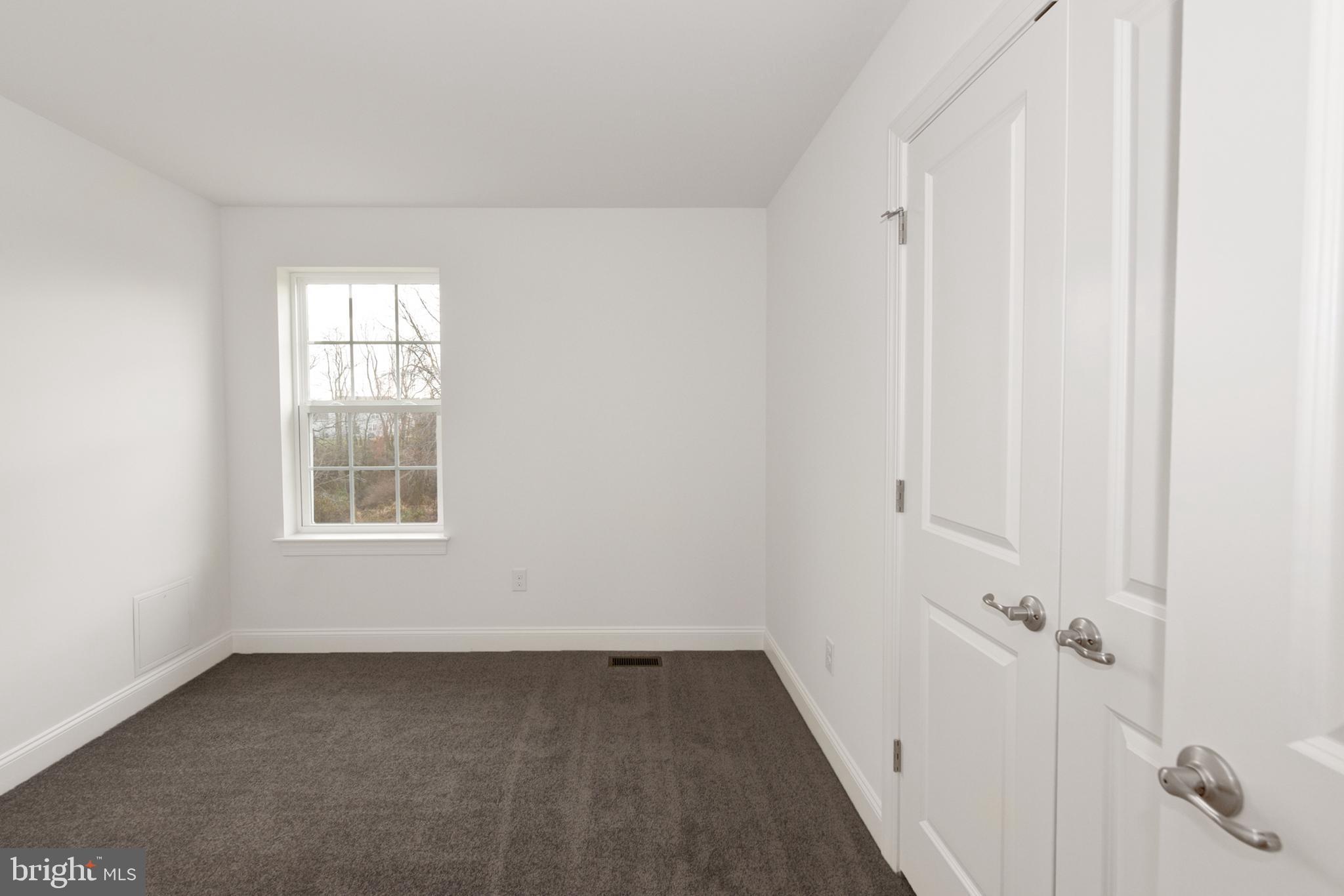 33 Seldon Drive, Unit 3 Smyrna, DE 19977 - Photo 15 of 24 a view of a room that has a window in it