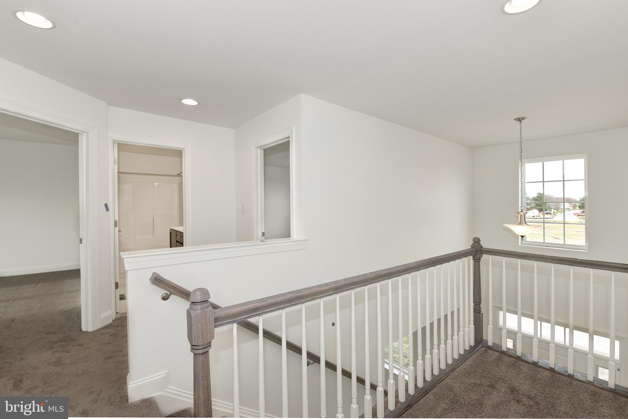 33 Seldon Drive, Unit 3 Smyrna, DE 19977 - Photo 16 of 24 a view of a hallway with window