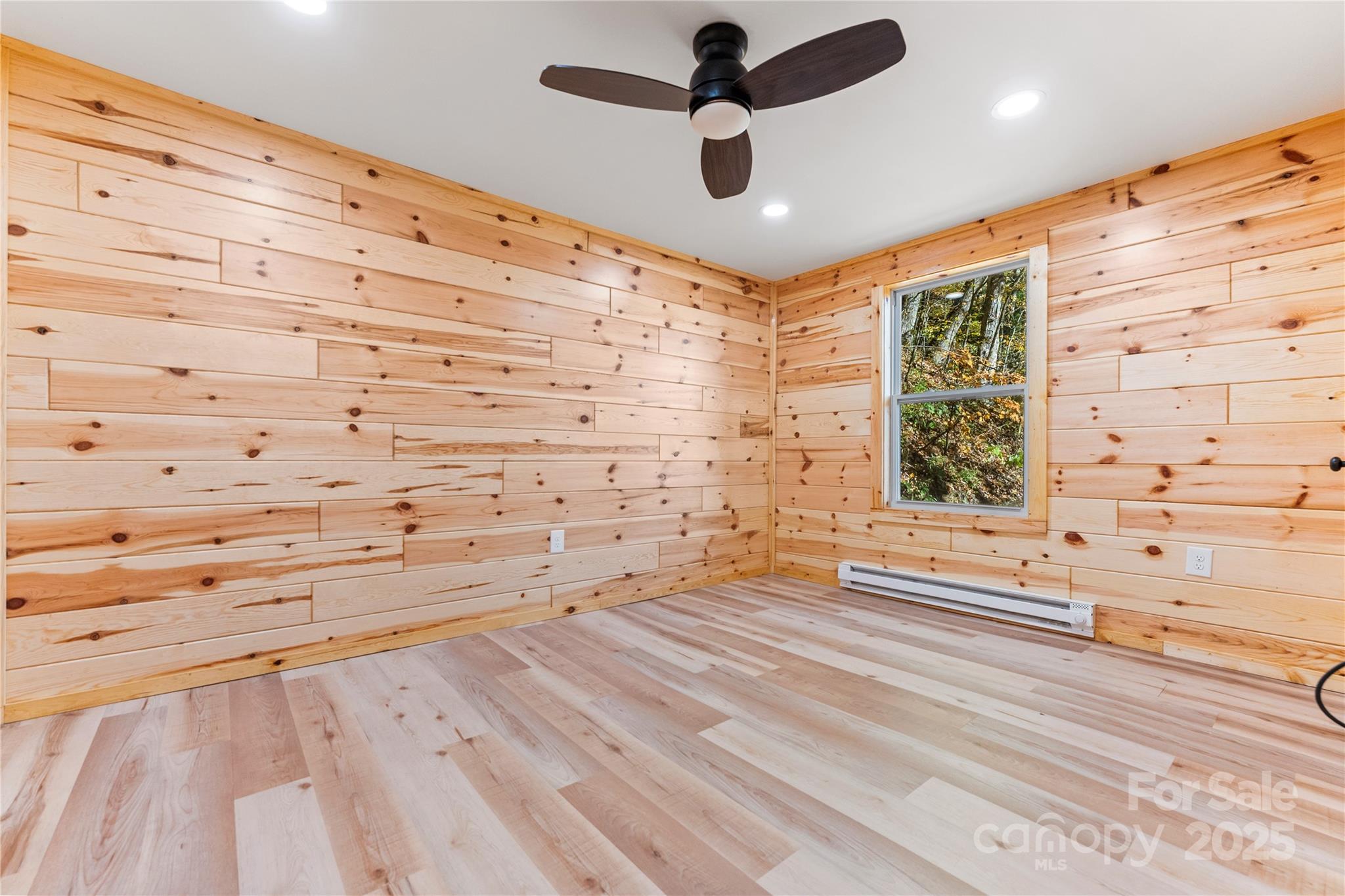 430 Long Branch Road Maggie Valley, NC 28751 - Photo 15 of 34 wooden floor in an empty room