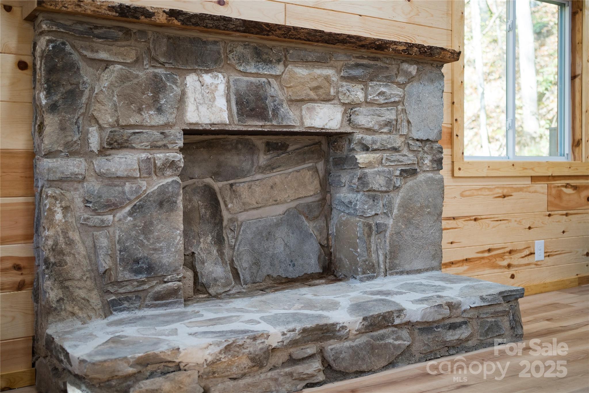 430 Long Branch Road Maggie Valley, NC 28751 - Photo 16 of 34 a room with fireplace