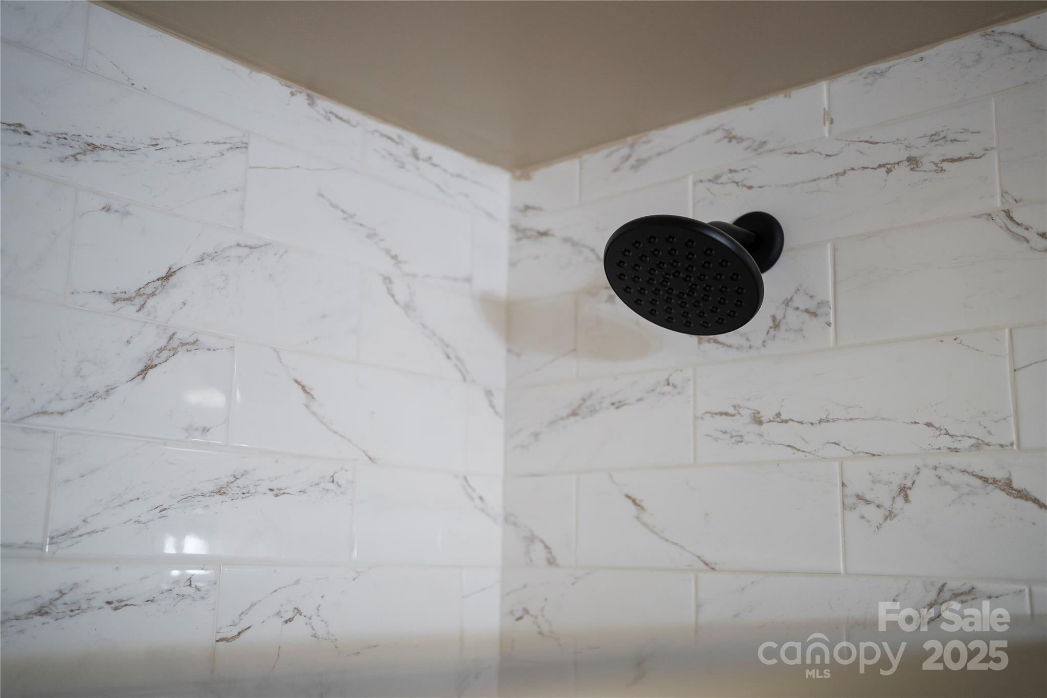 430 Long Branch Road Maggie Valley, NC 28751 - Photo 21 of 34 a bathroom with a sink and vanity