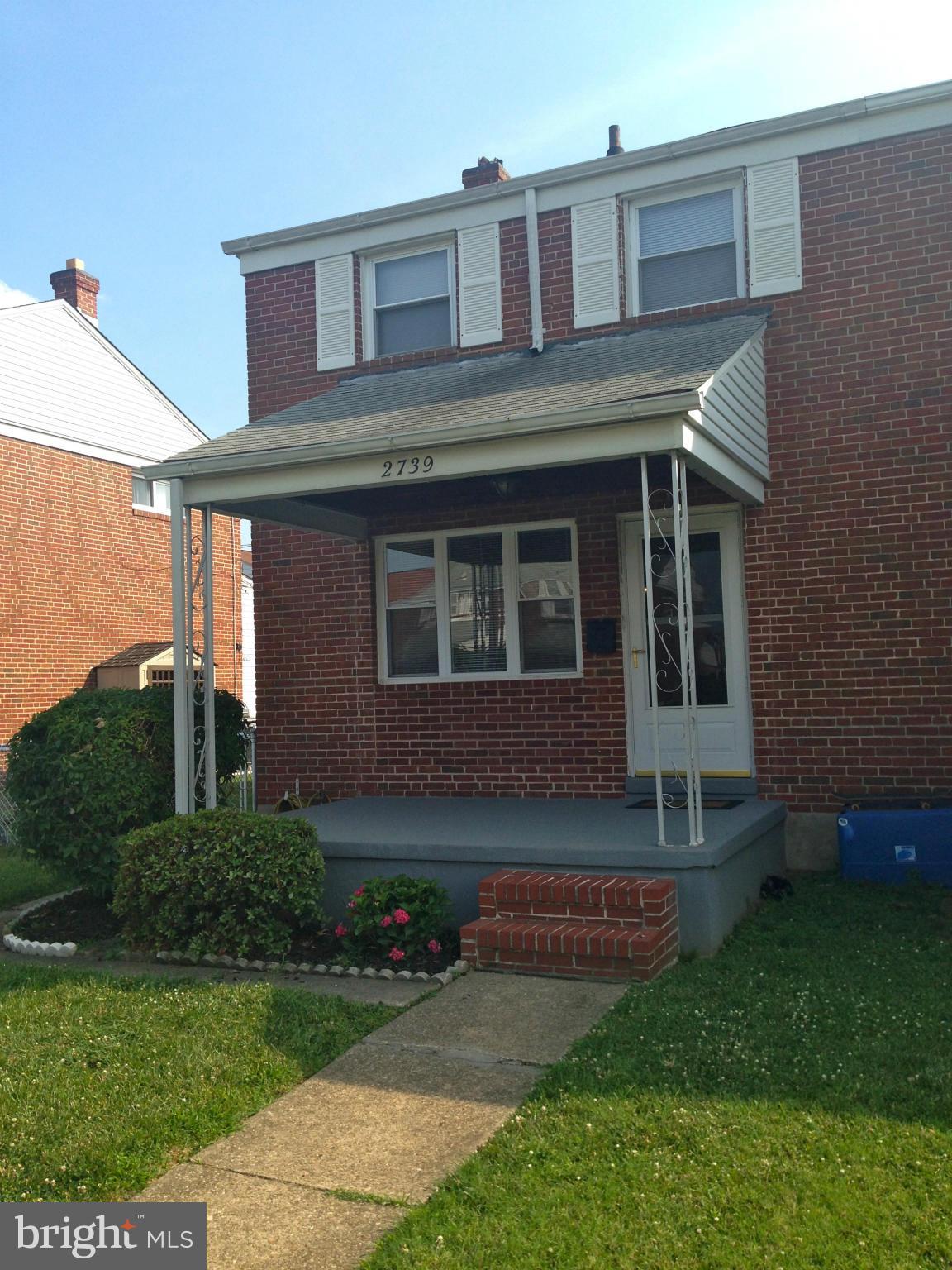 2739 Kirkleigh Road Baltimore, MD 21222 - Photo 1 of 30 a house view with a garden space