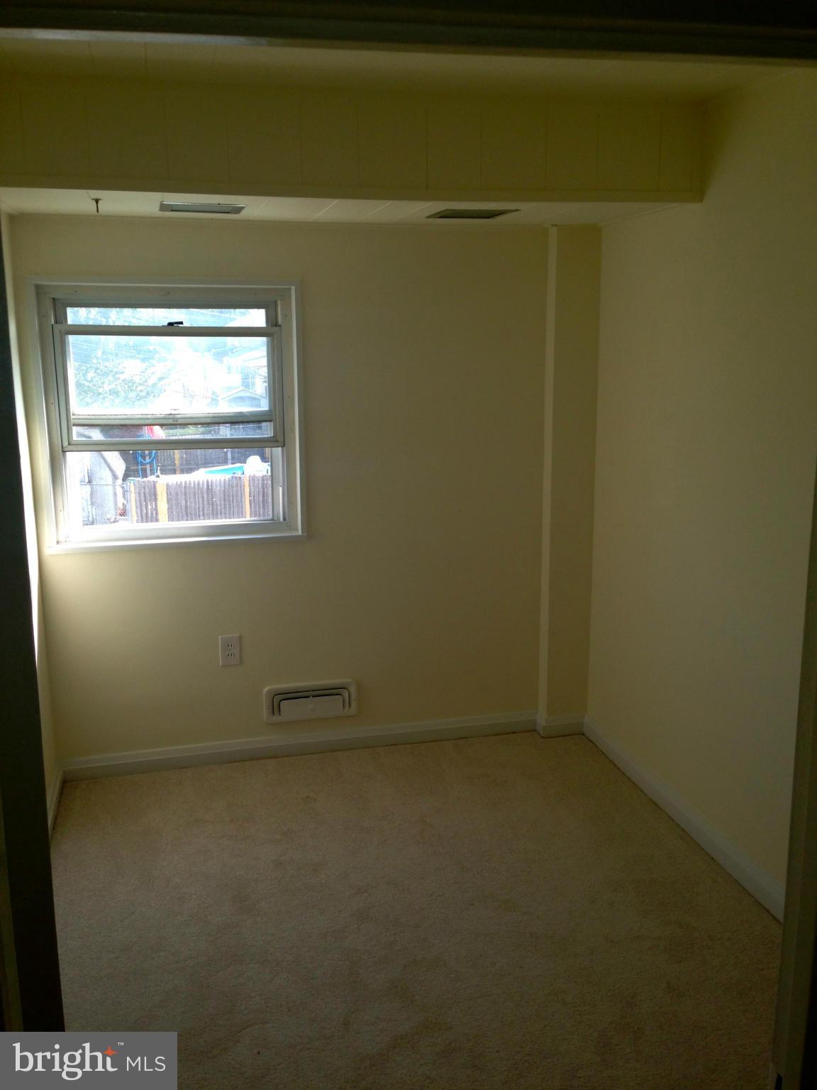 2739 Kirkleigh Road Baltimore, MD 21222 - Photo 19 of 30 a view of a room with window