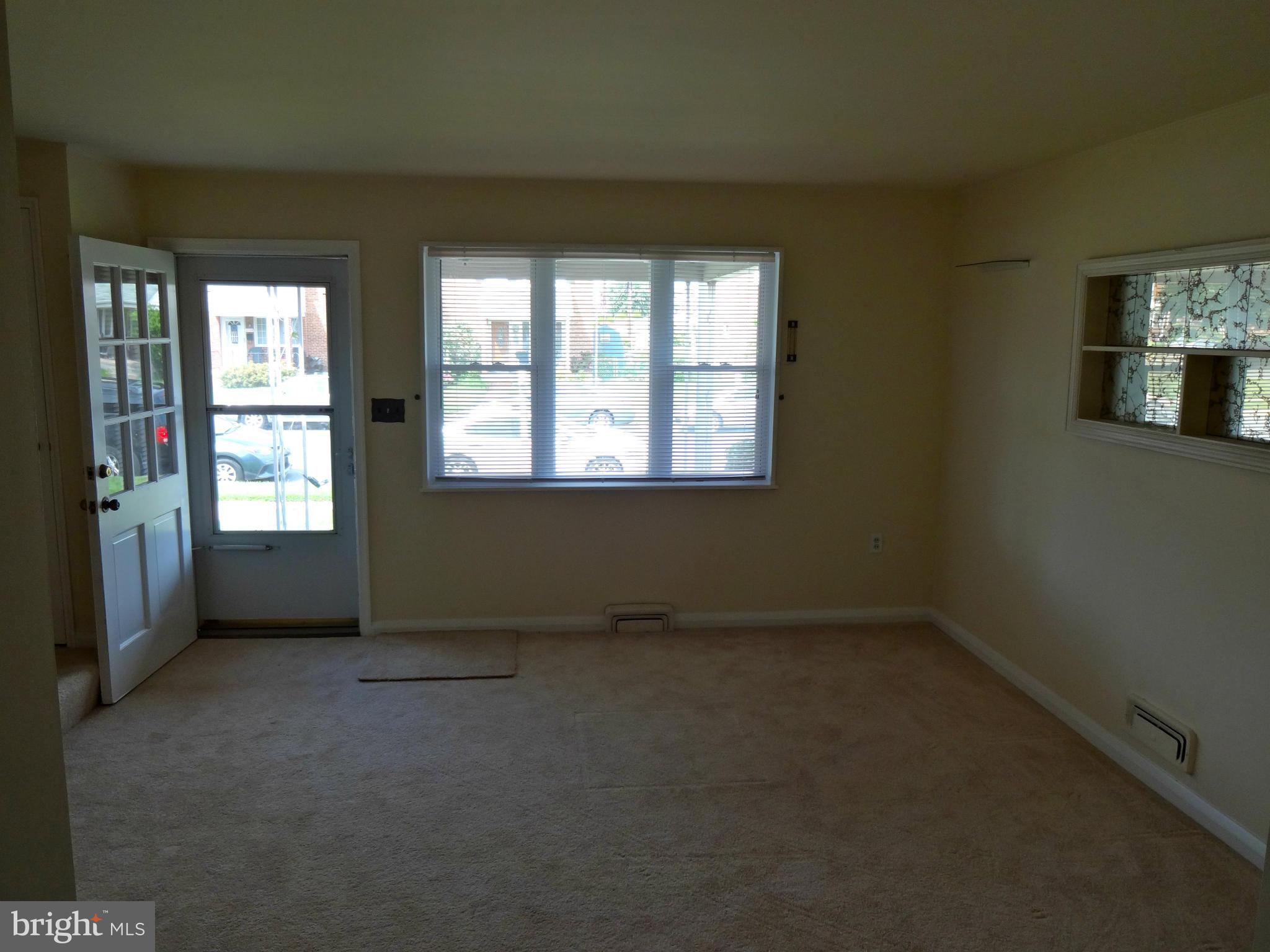 2739 Kirkleigh Road Baltimore, MD 21222 - Photo 4 of 30 an empty room with a window