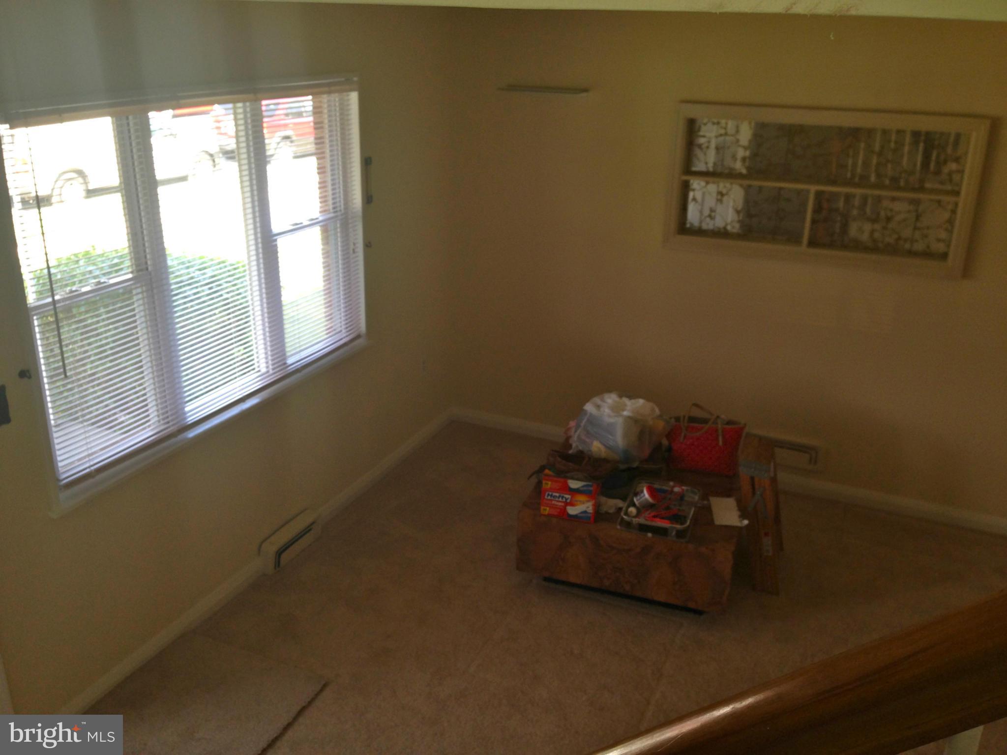 2739 Kirkleigh Road Baltimore, MD 21222 - Photo 6 of 30 a room with a window