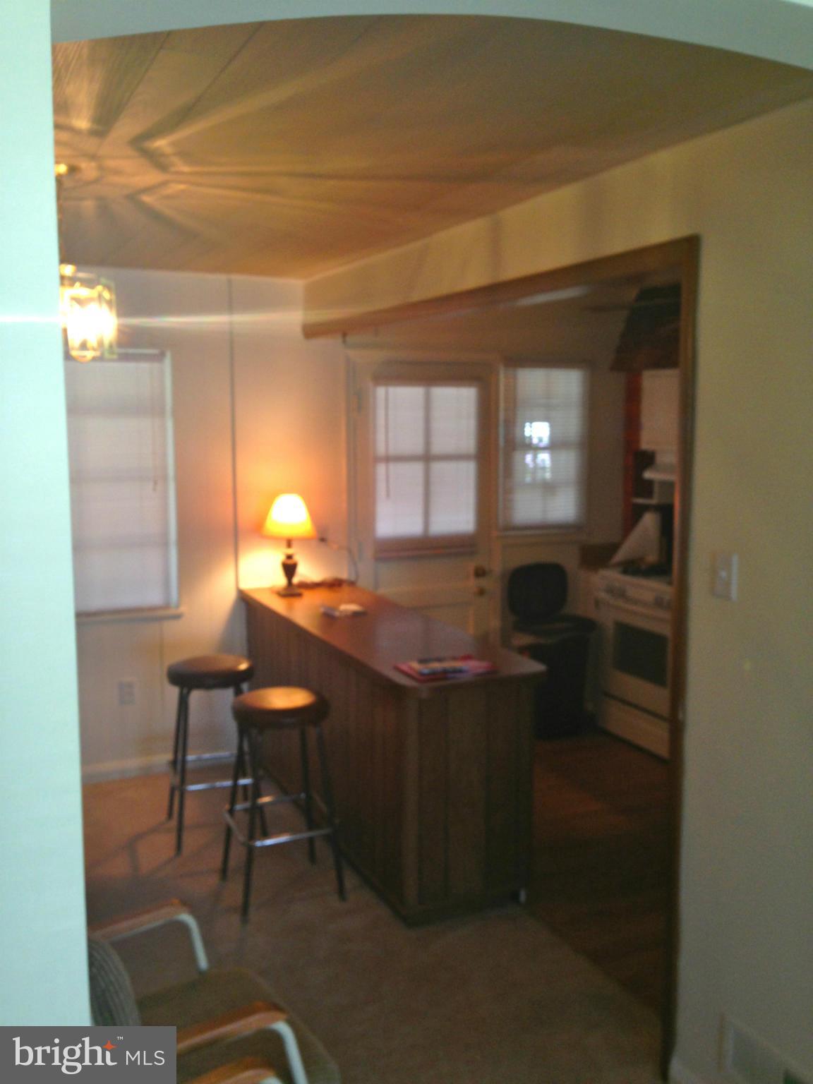2739 Kirkleigh Road Baltimore, MD 21222 - Photo 8 of 30 a room with furniture and window