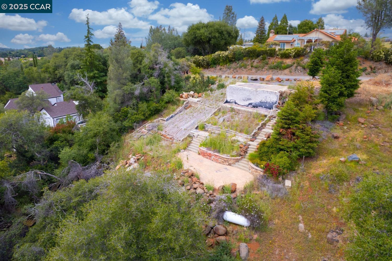 3098 Oakwood Road Cameron Park, CA 95682 - Photo 11 of 17 a view of a pathway both side of yard