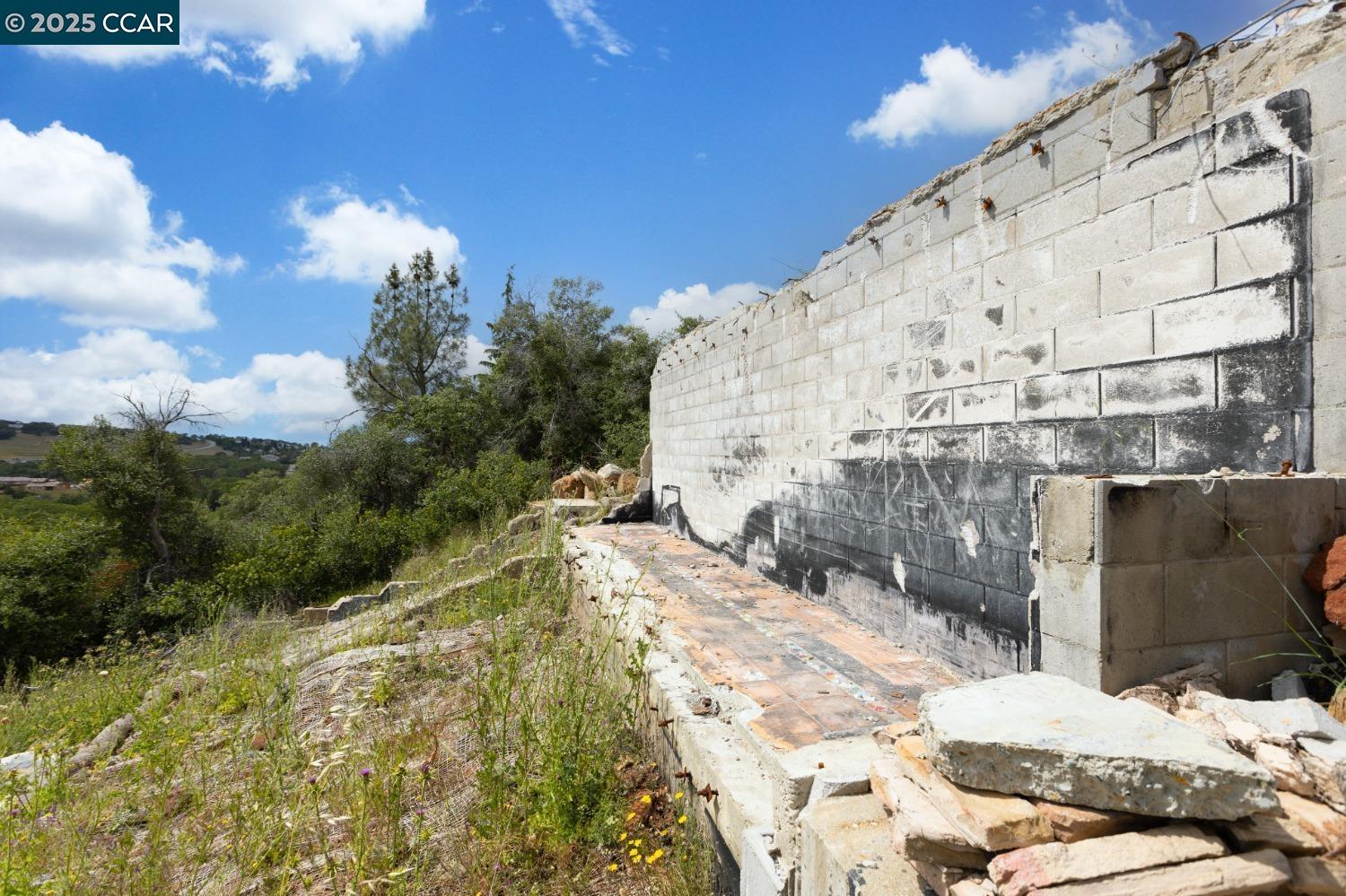 3098 Oakwood Road Cameron Park, CA 95682 - Photo 8 of 17 a view of roof with building and trees around
