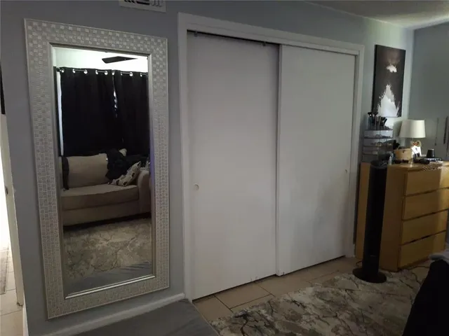 a view of a bedroom from hallway