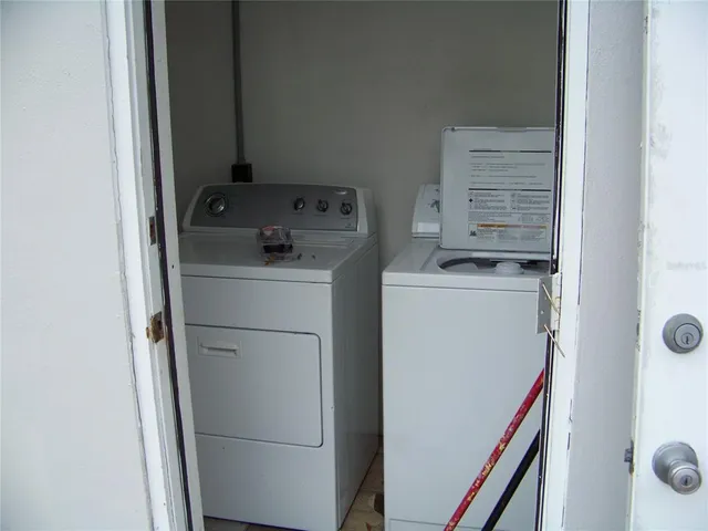 a utility room with dryer and washer