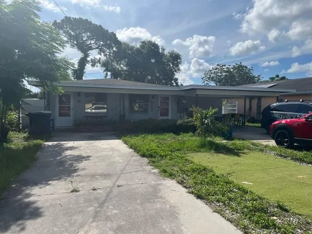 a backyard of a house with lots of green space