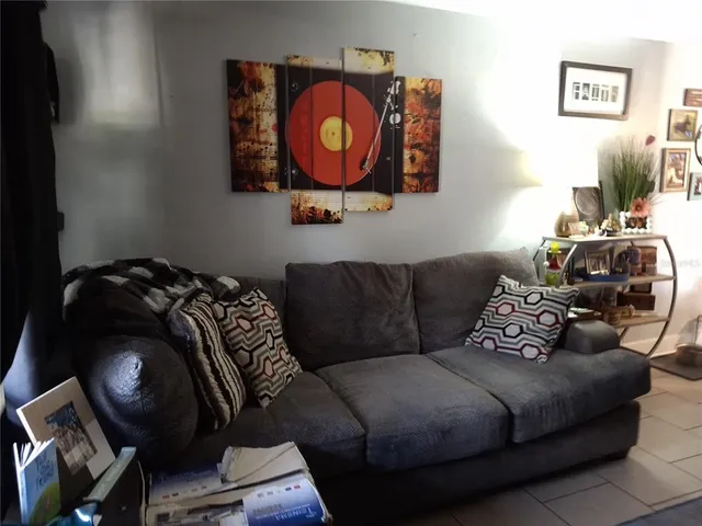 a bedroom with a bed and cabinets