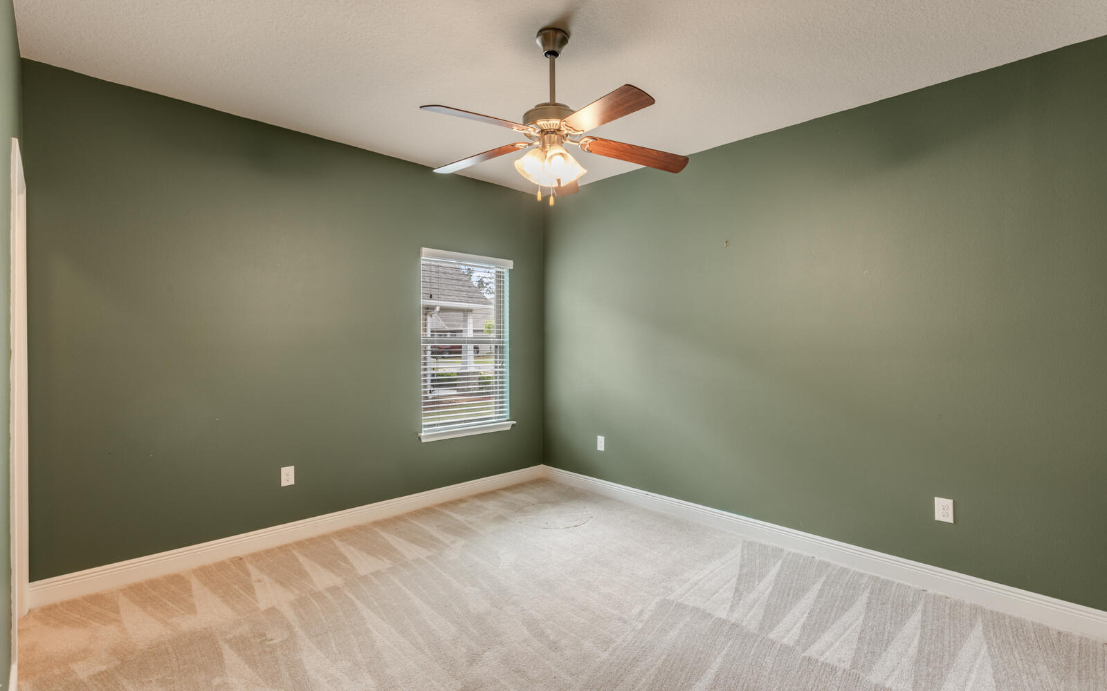 379 Whitman Way Freeport, FL 32439 - Photo 45 of 97 a view of a livingroom with a chandelier fan