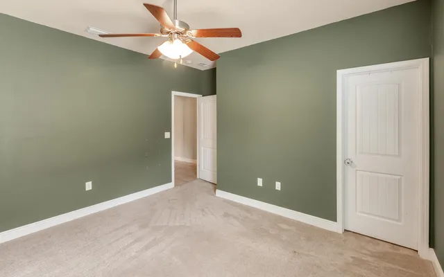 a view of a house with sitting area and garden
