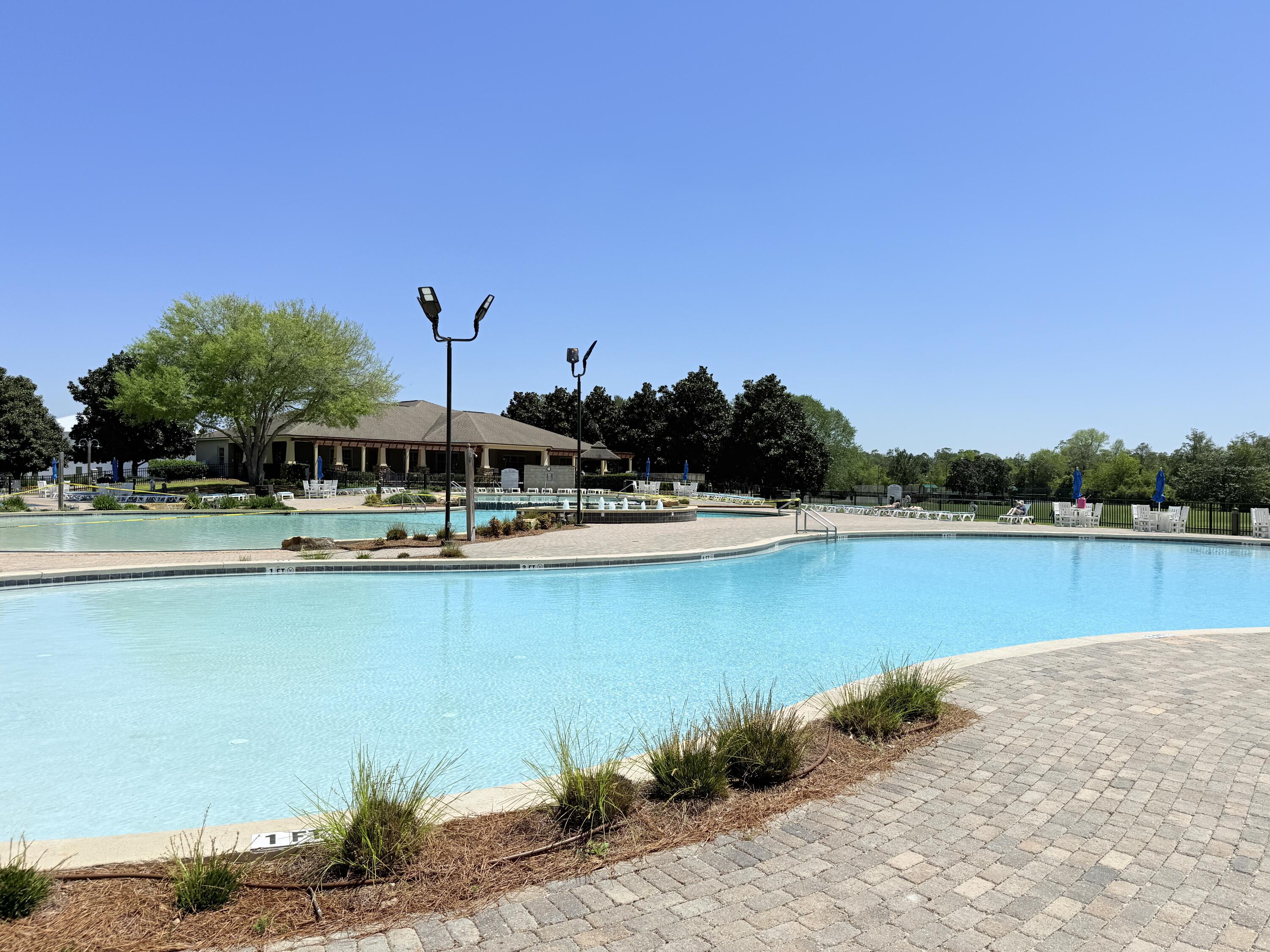379 Whitman Way Freeport, FL 32439 - Photo 74 of 97 a view of a lake with houses
