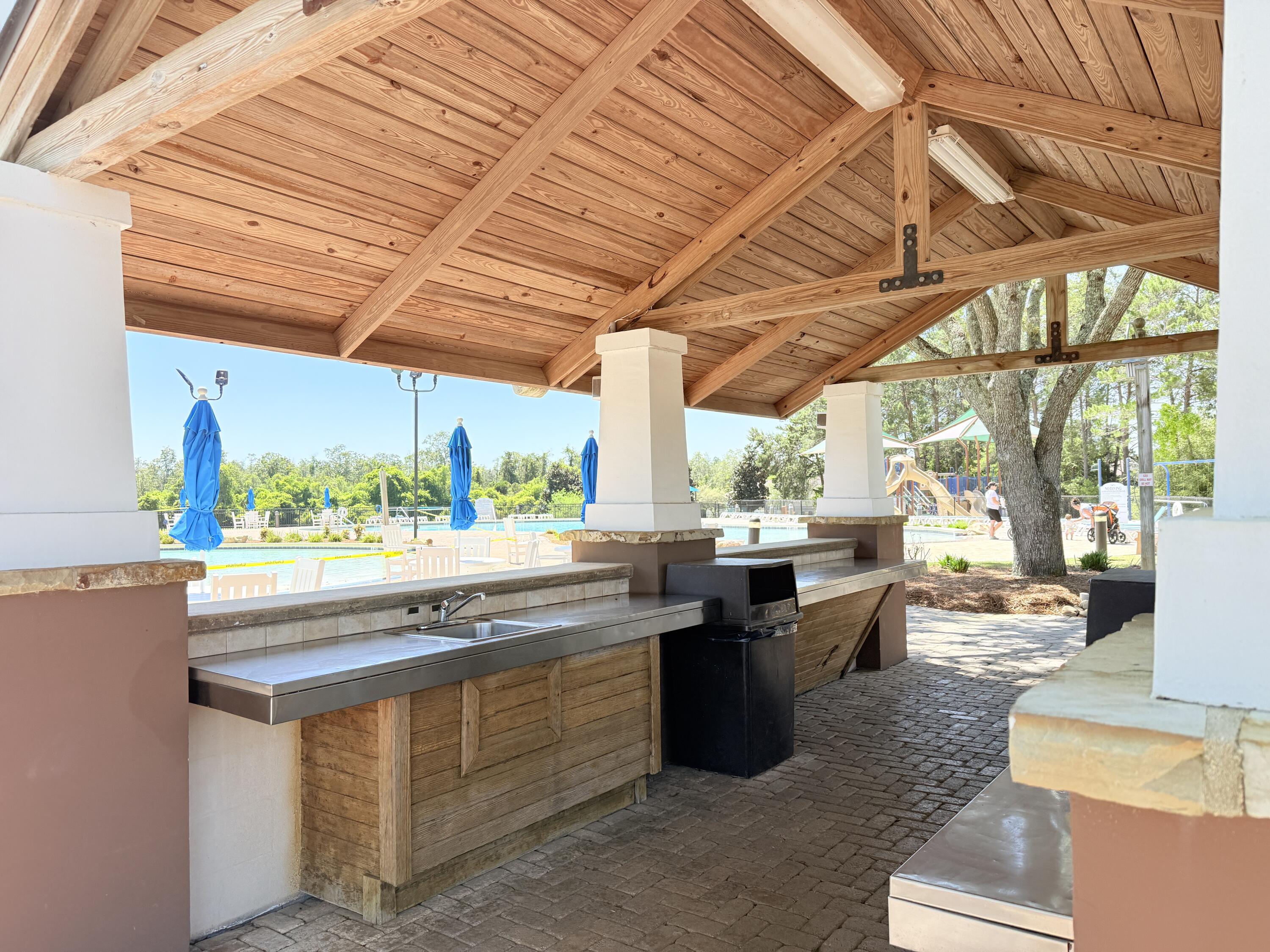 379 Whitman Way Freeport, FL 32439 - Photo 77 of 97 a kitchen with a sink and large window