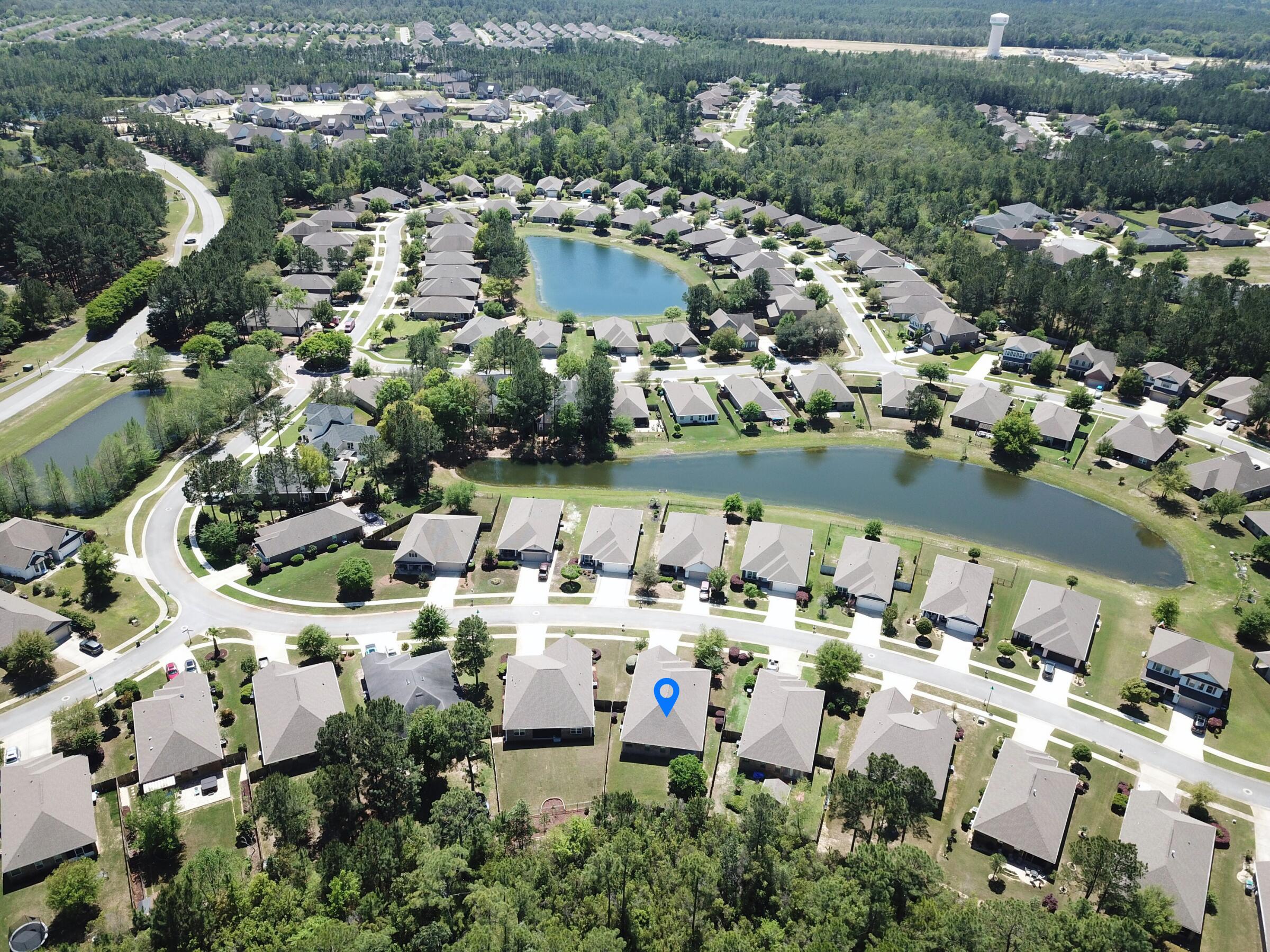 379 Whitman Way Freeport, FL 32439 - Photo 86 of 97 an aerial view of a city with lots of residential buildings