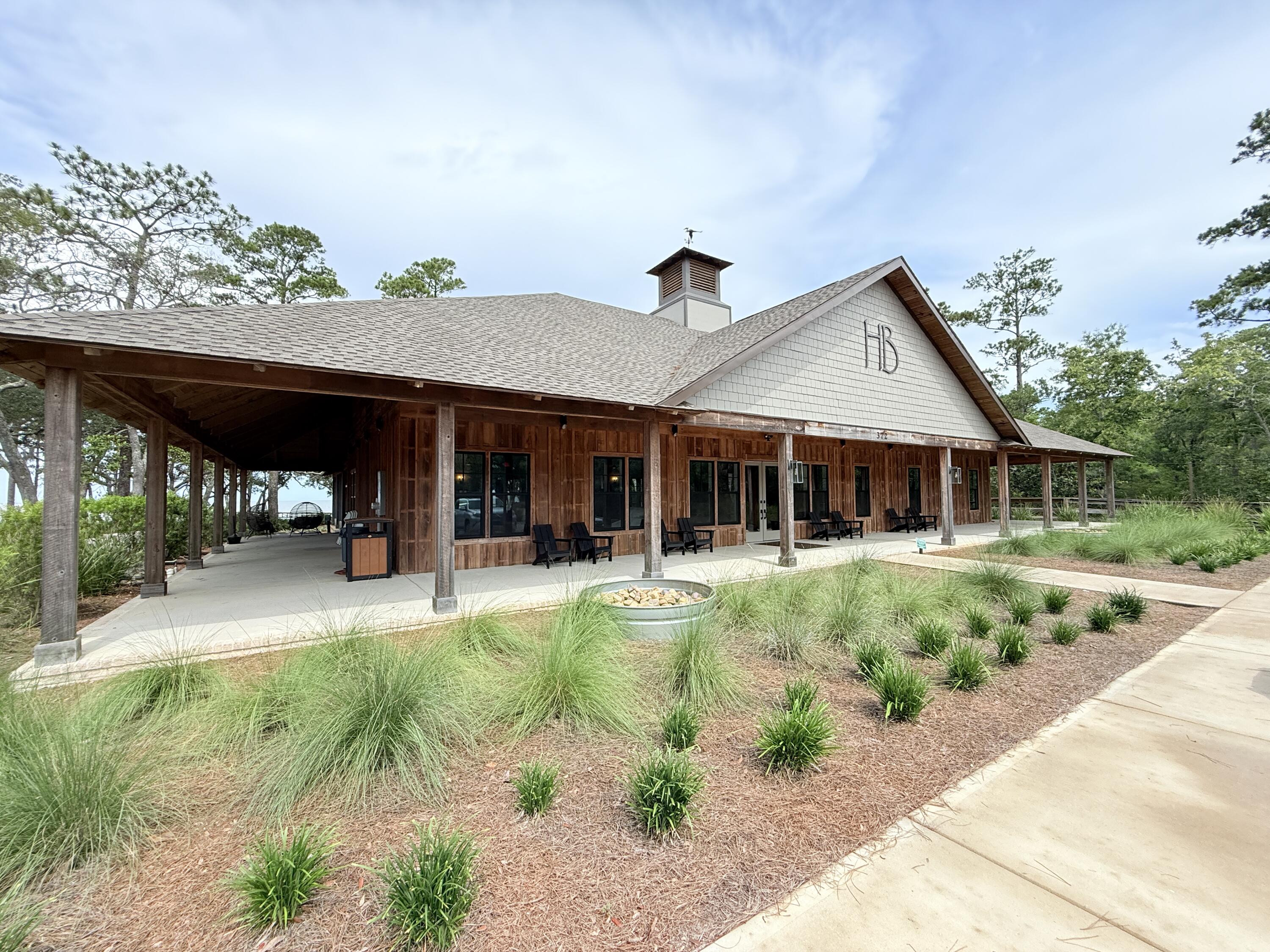 379 Whitman Way Freeport, FL 32439 - Photo 89 of 97 a view of a house with sitting area and garden