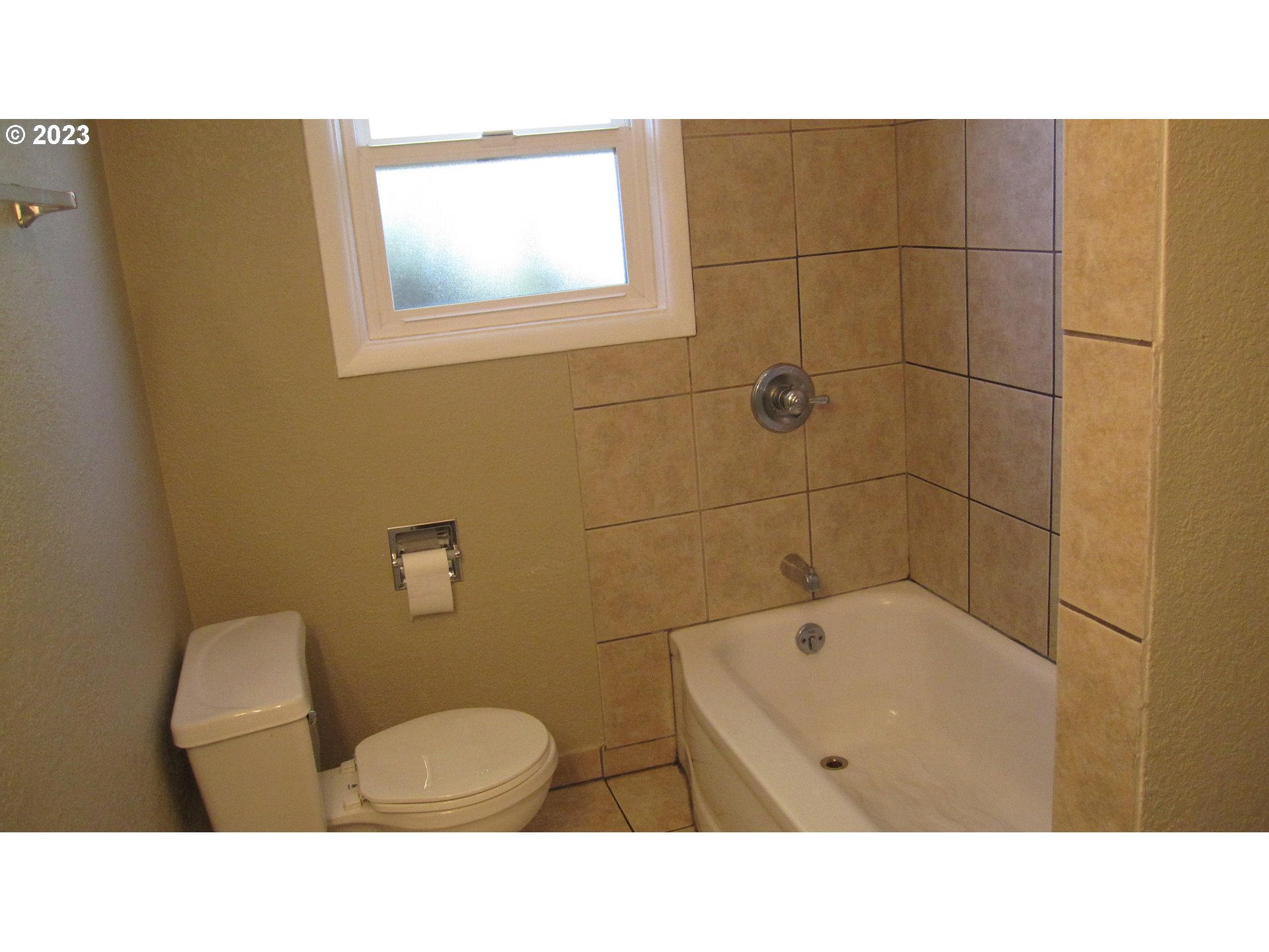 710 26th Street Springfield, OR 97477 - Photo 18 of 48 a bathroom with a sink toilet and shower