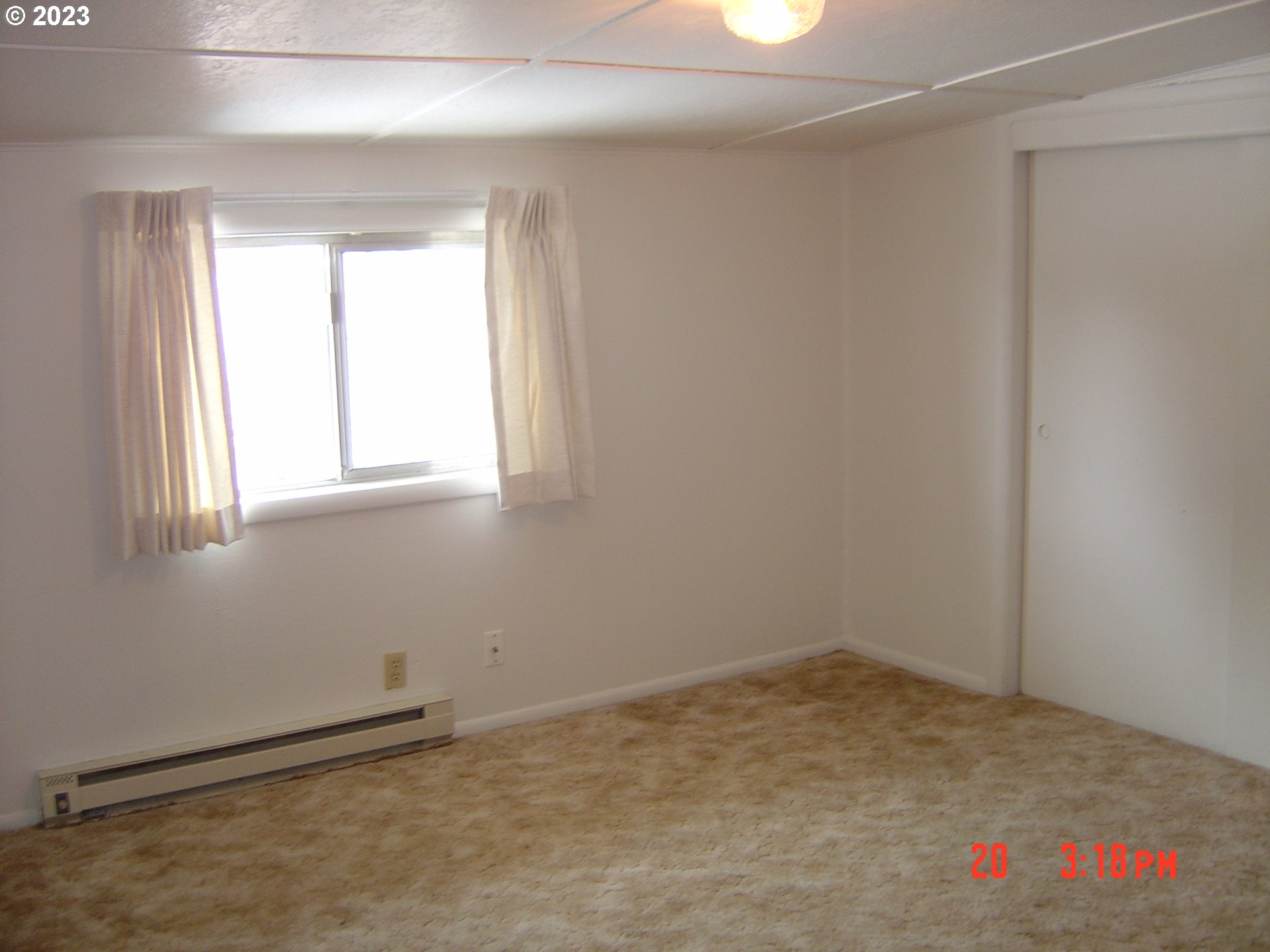 710 26th Street Springfield, OR 97477 - Photo 40 of 48 an empty room with a empty space and windows
