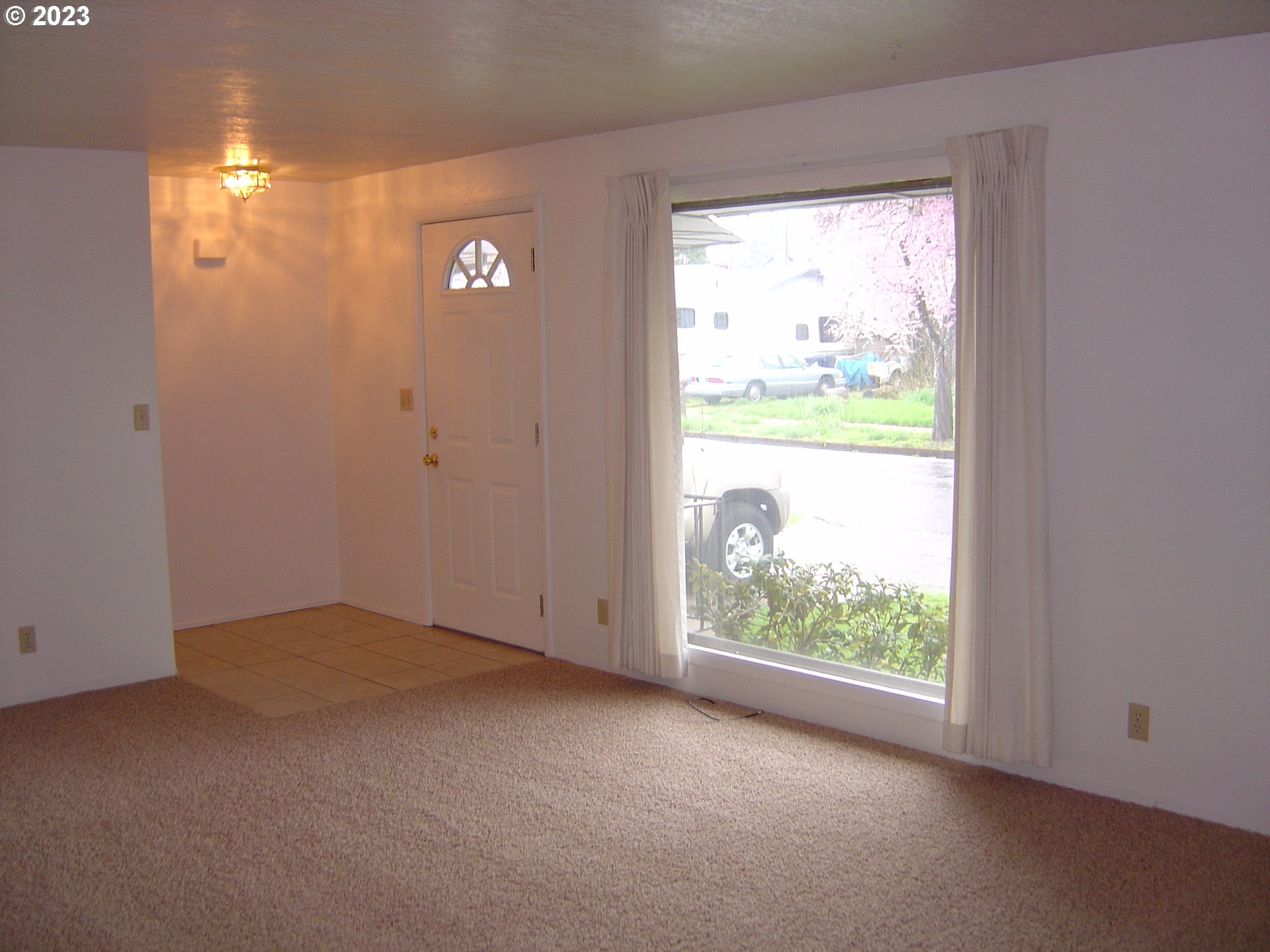710 26th Street Springfield, OR 97477 - Photo 9 of 48 a view of an empty room with a window