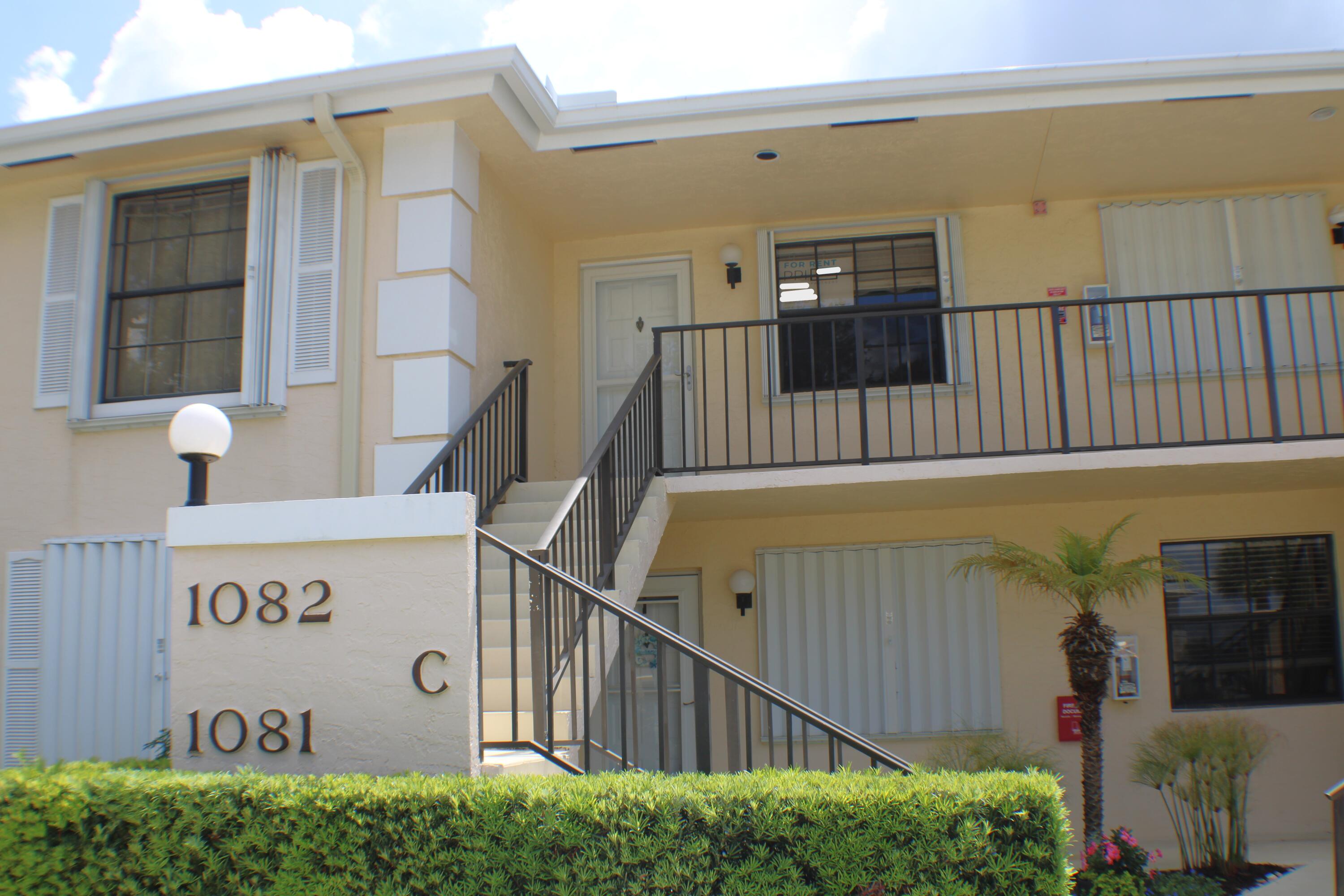 1082 Keystone Drive, Unit C Jupiter, FL 33458 - Photo 1 of 26 Front