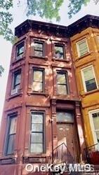 a tall building with a clock on it