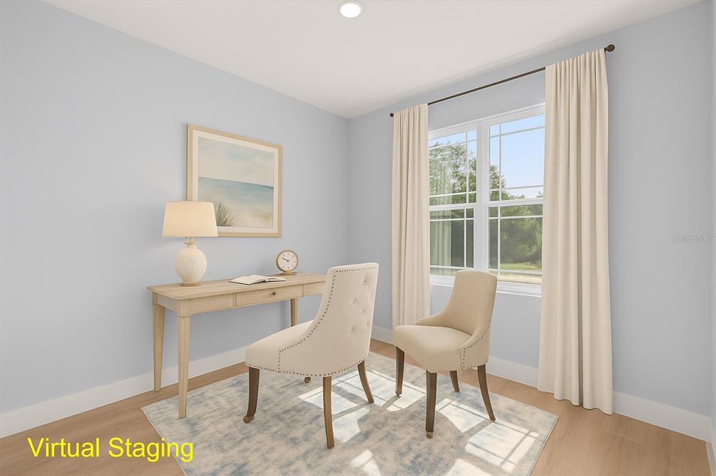 8736 Capilla Street Sebring, FL 33872 - Photo 47 of 60 a view of a workspace with furniture and a window