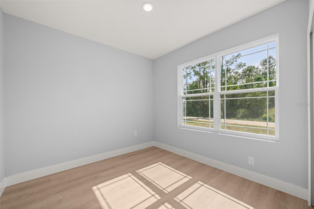 8736 Capilla Street Sebring, FL 33872 - Photo 48 of 60 an empty room with a window