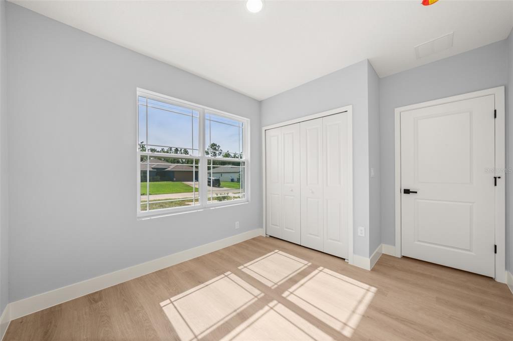 8736 Capilla Street Sebring, FL 33872 - Photo 49 of 60 a view of an empty room and window