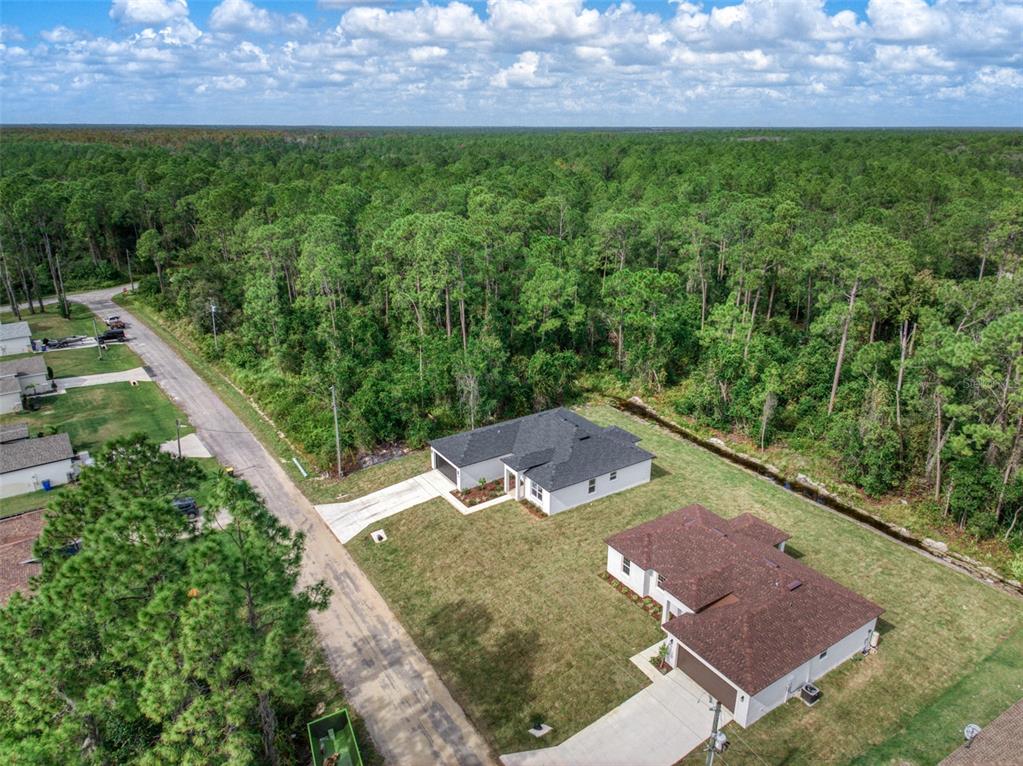 8736 Capilla Street Sebring, FL 33872 - Photo 54 of 60 an aerial view of a house