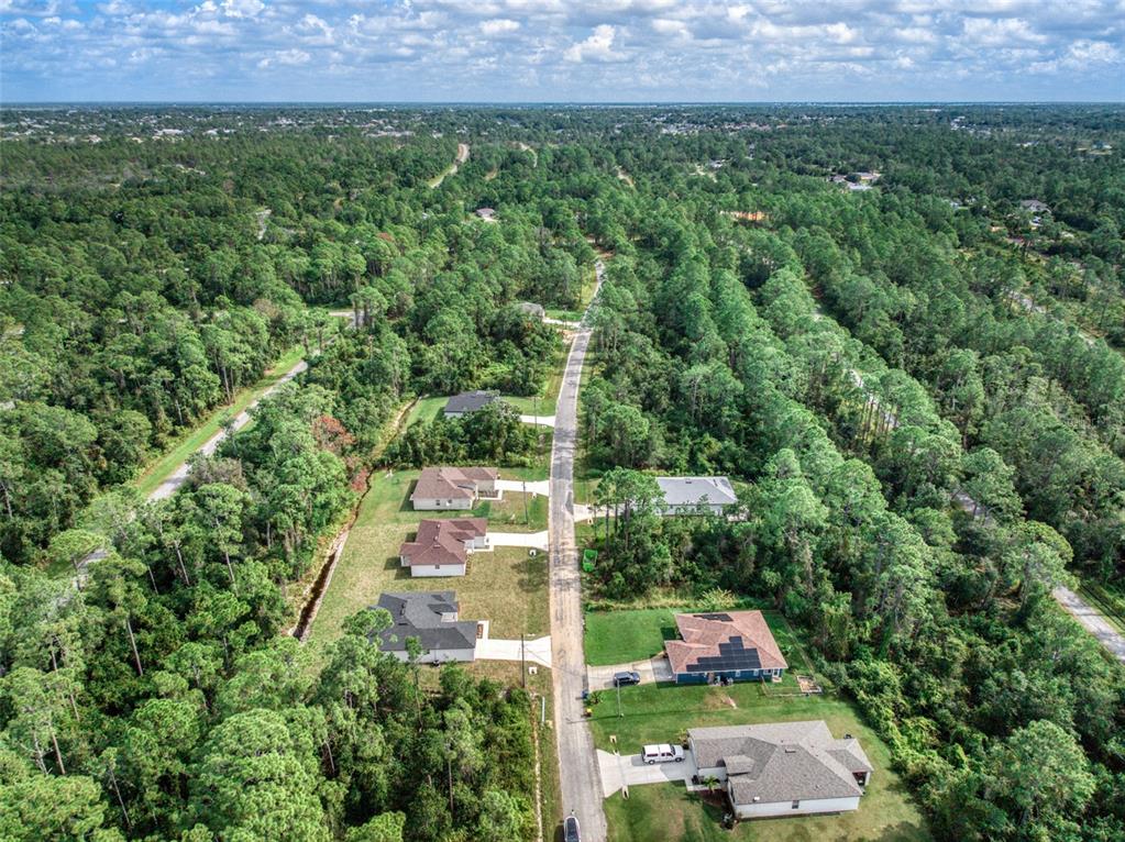 8736 Capilla Street Sebring, FL 33872 - Photo 56 of 60 an aerial view of house with yard