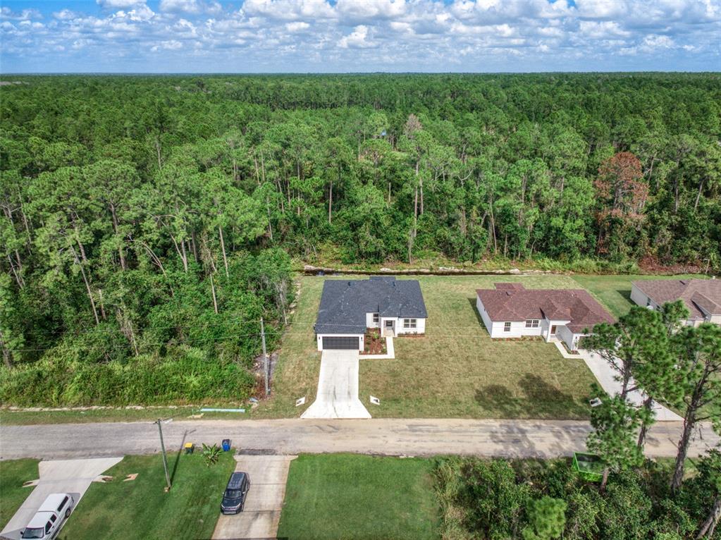 8736 Capilla Street Sebring, FL 33872 - Photo 58 of 60 an aerial view of a house