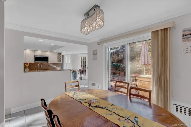 a bed room with a bed and a chair