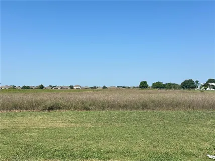 a view of lake with mountain in the background