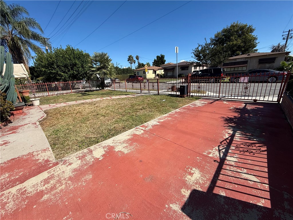 1317 South Temple Avenue Compton, CA 90221 - Photo 6 of 13 a view of a yard with a slide