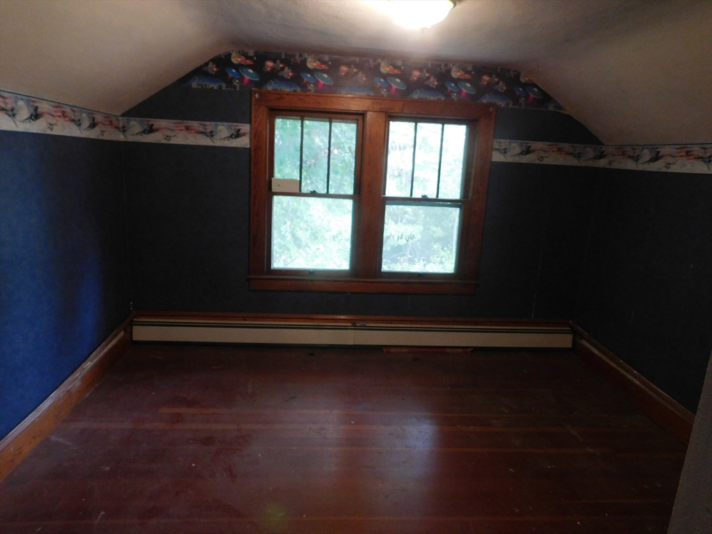 641 Northampton Street Holyoke, MA 01040 - Photo 17 of 19 a view of room with hardwood floor and window