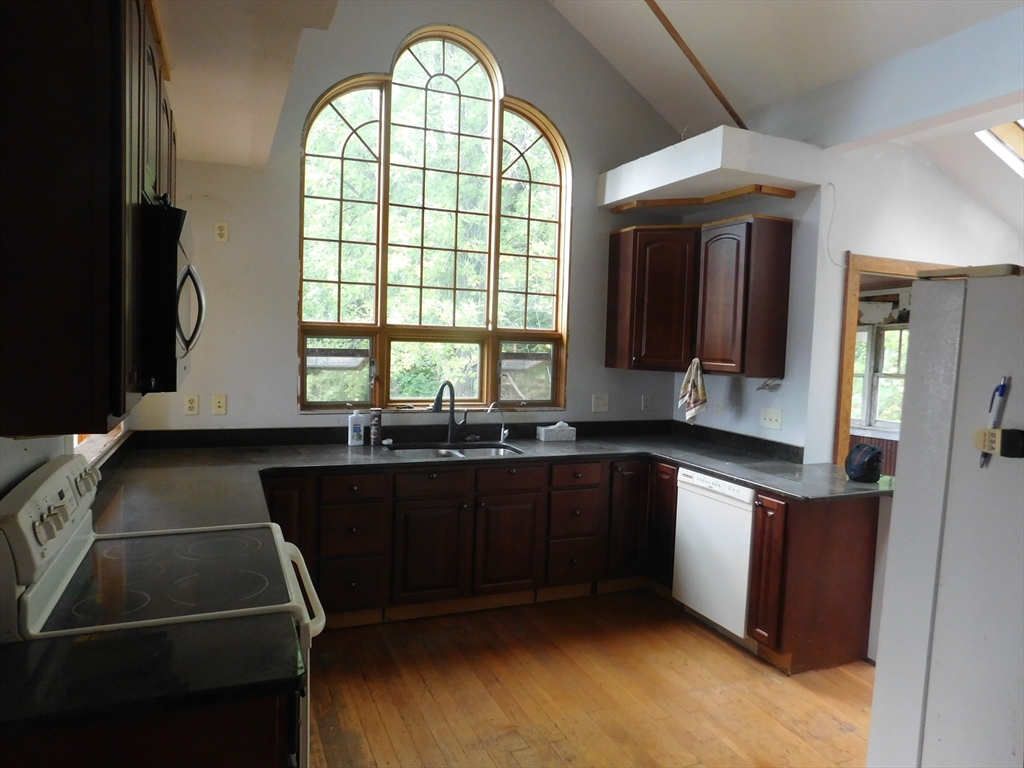 641 Northampton Street Holyoke, MA 01040 - Photo 5 of 19 a kitchen with sink and window