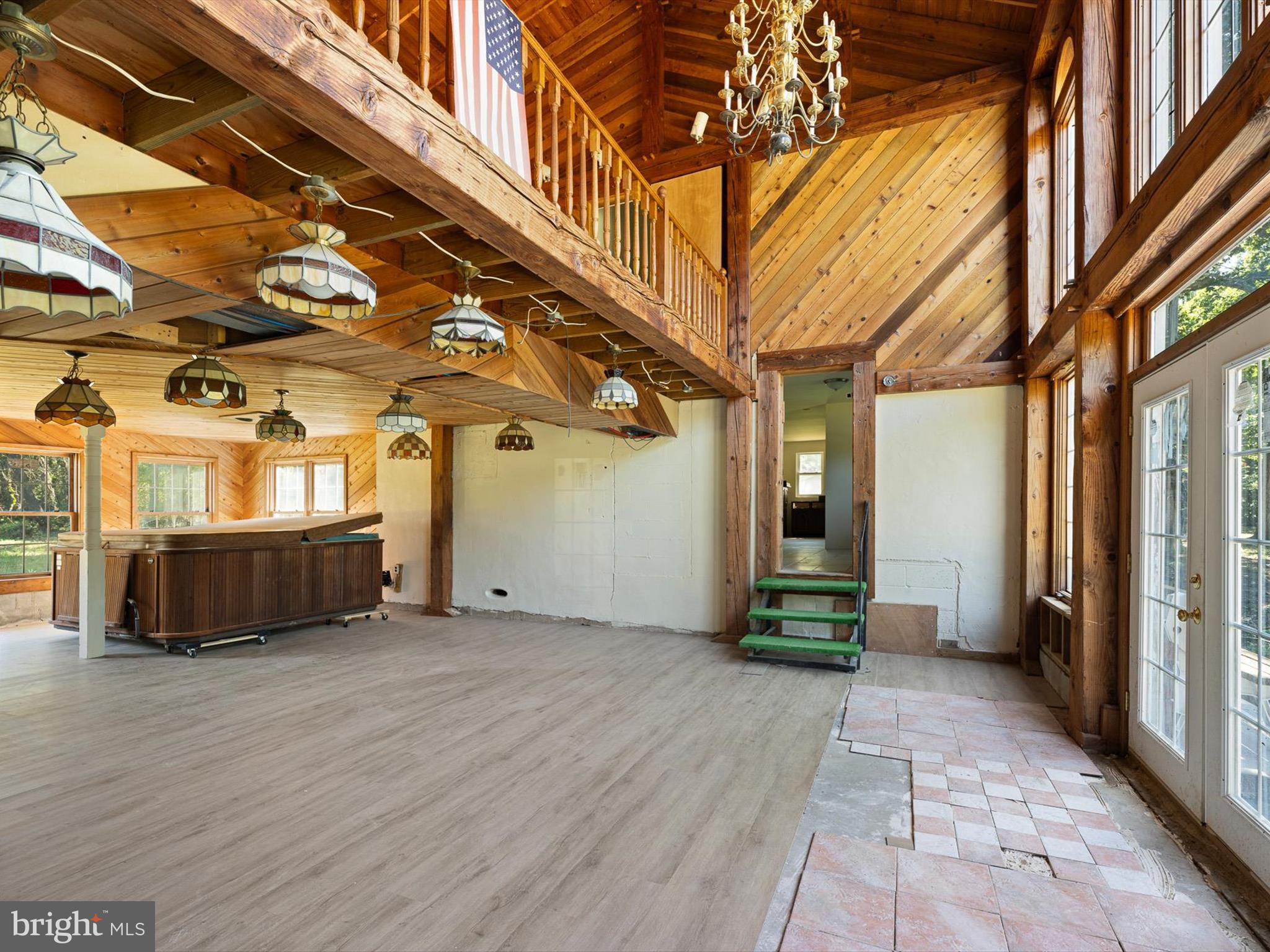 16327 Old Mill Road Lewes, DE 19958 - Photo 13 of 35 a view of a porch with wooden floor