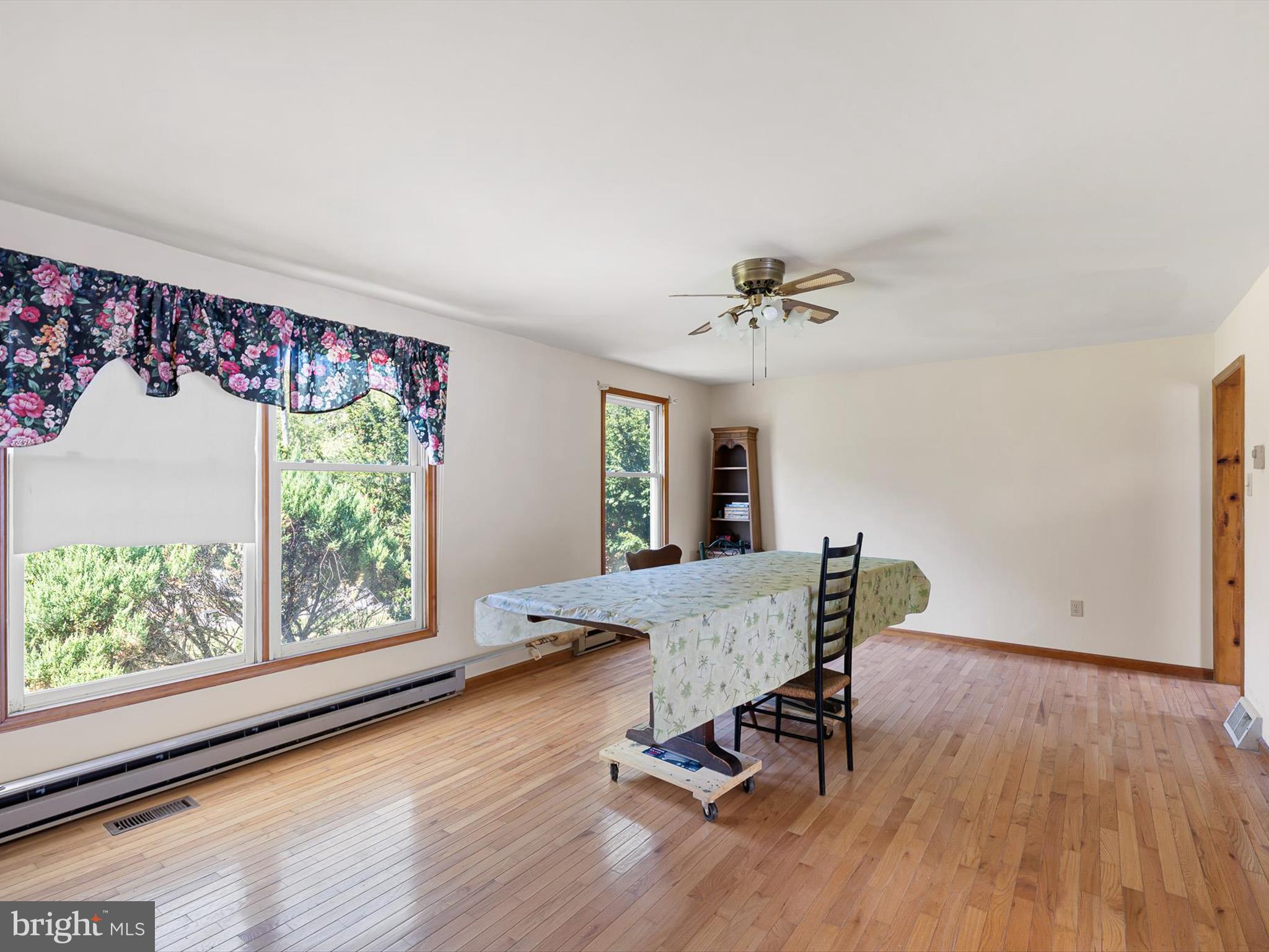 16327 Old Mill Road Lewes, DE 19958 - Photo 27 of 35 a view of a livingroom with furniture window and wooden floor