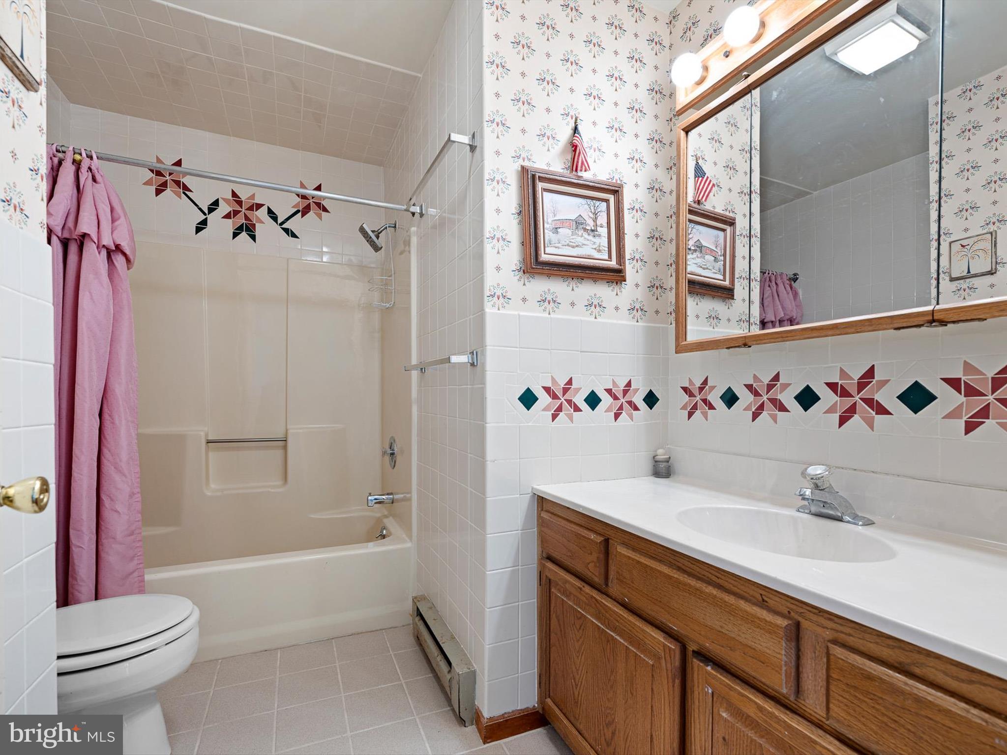 16327 Old Mill Road Lewes, DE 19958 - Photo 28 of 35 a bathroom with a sink and a toilet